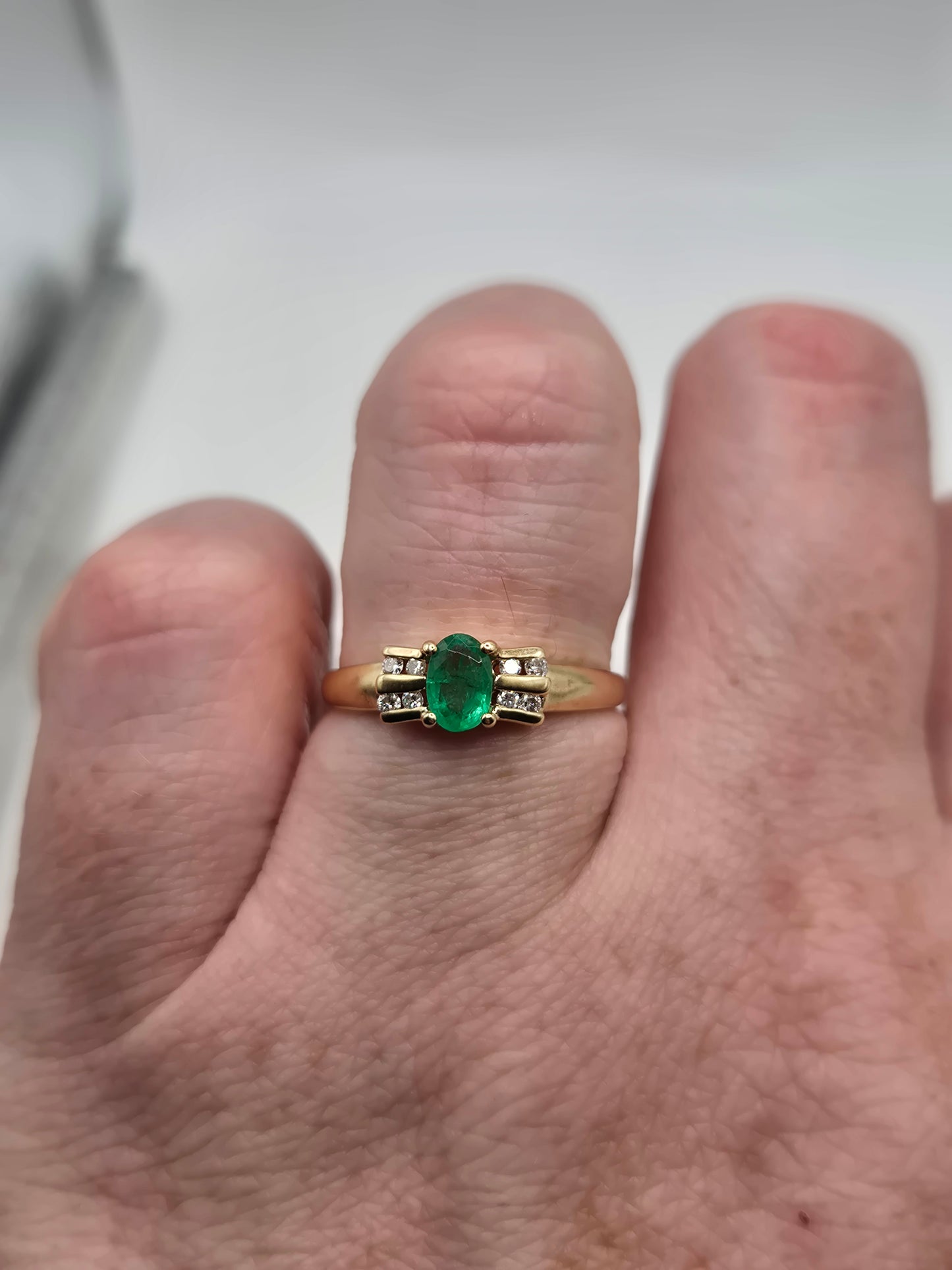 9ct gold emerald and diamond ring