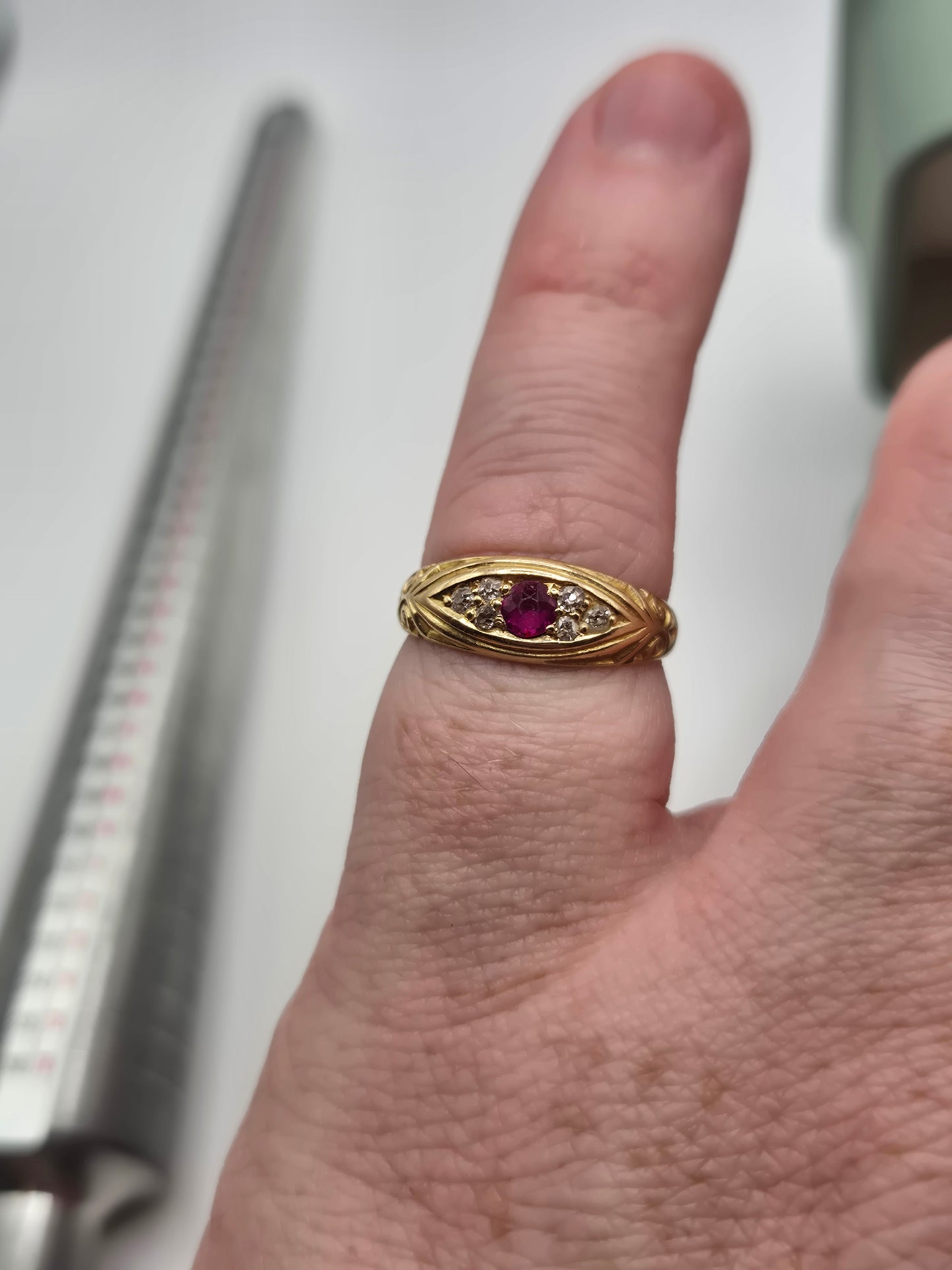 Heavy 18ct gold ruby and diamond gypsy ring