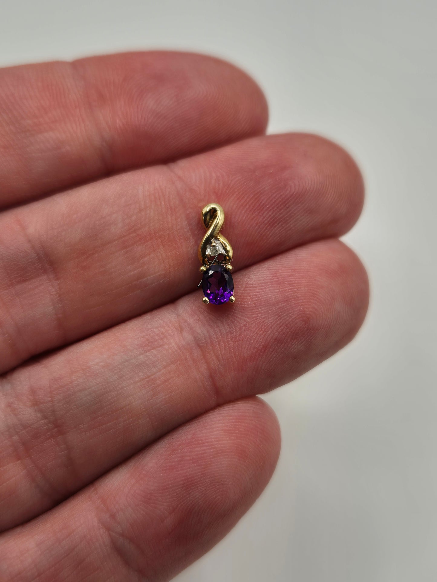 9ct gold amethyst and diamond pendant