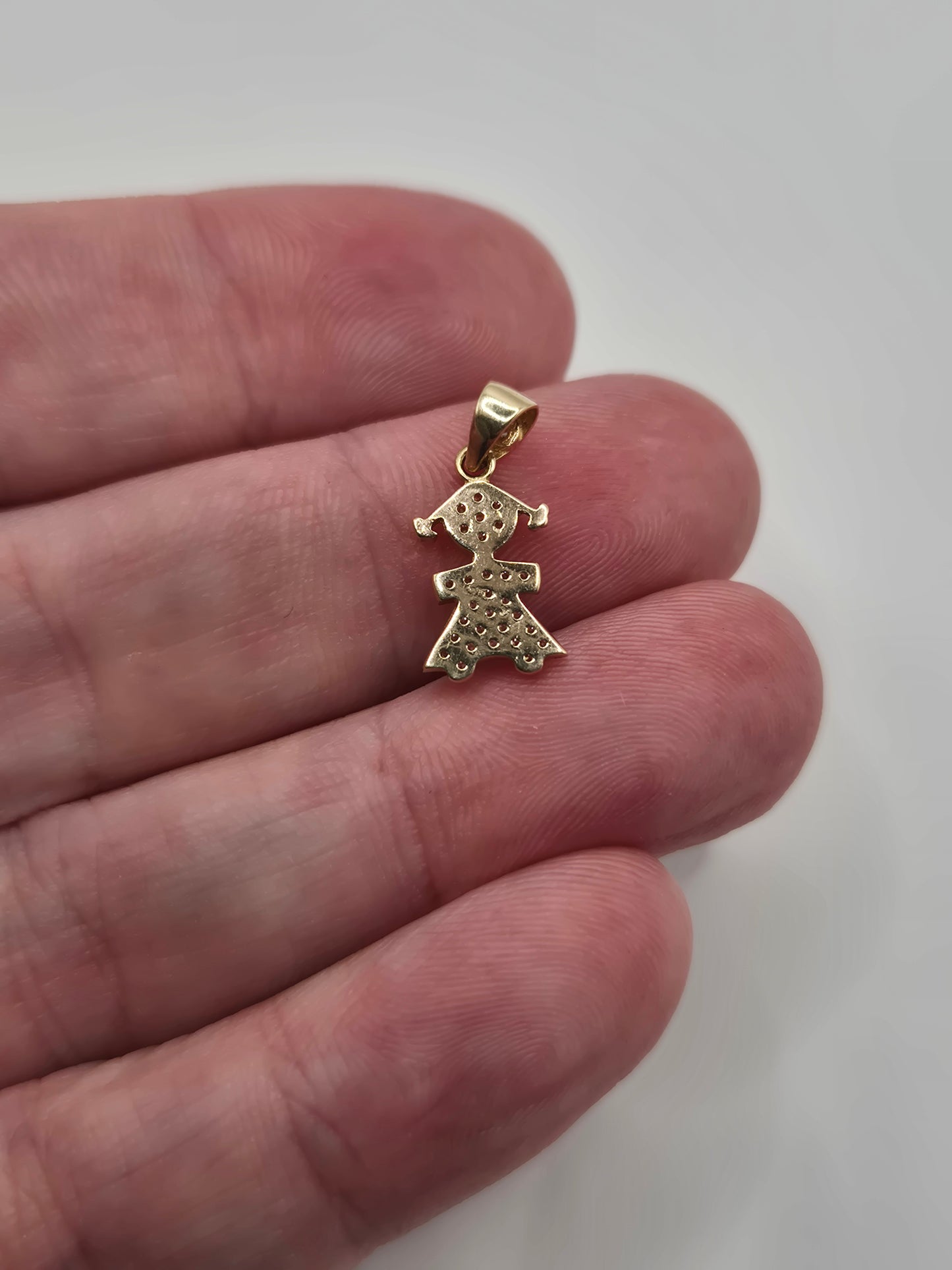 14ct gold doll pendant
