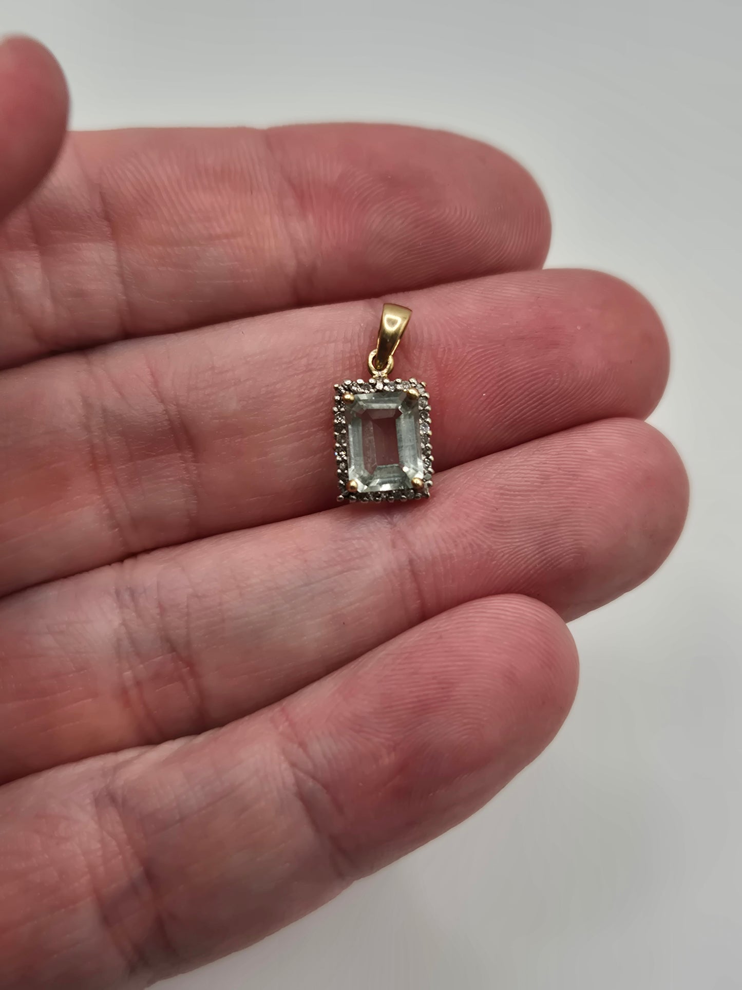 9ct gold topaz and diamond pendant
