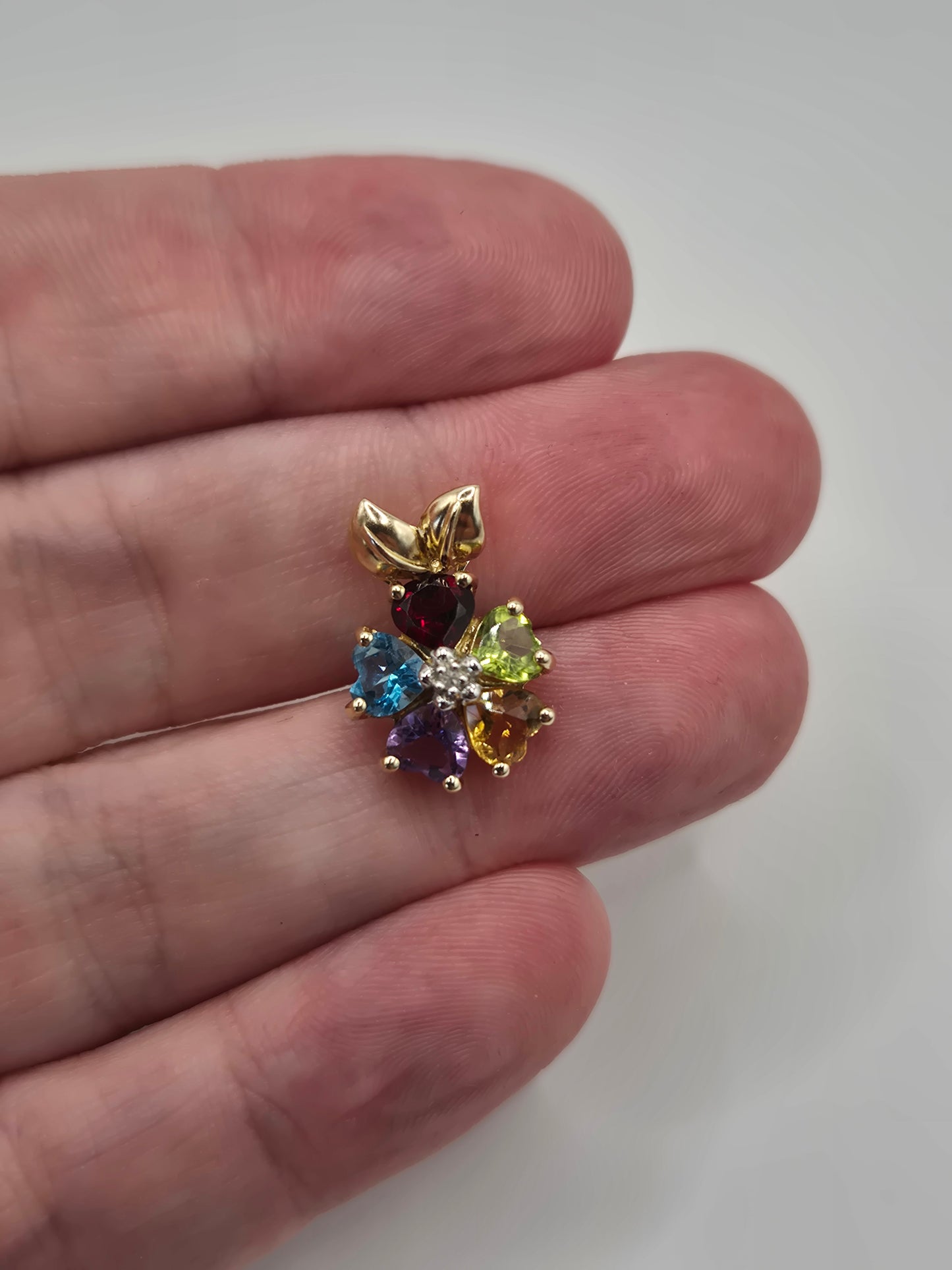 9ct gold multigem and diamond pendant