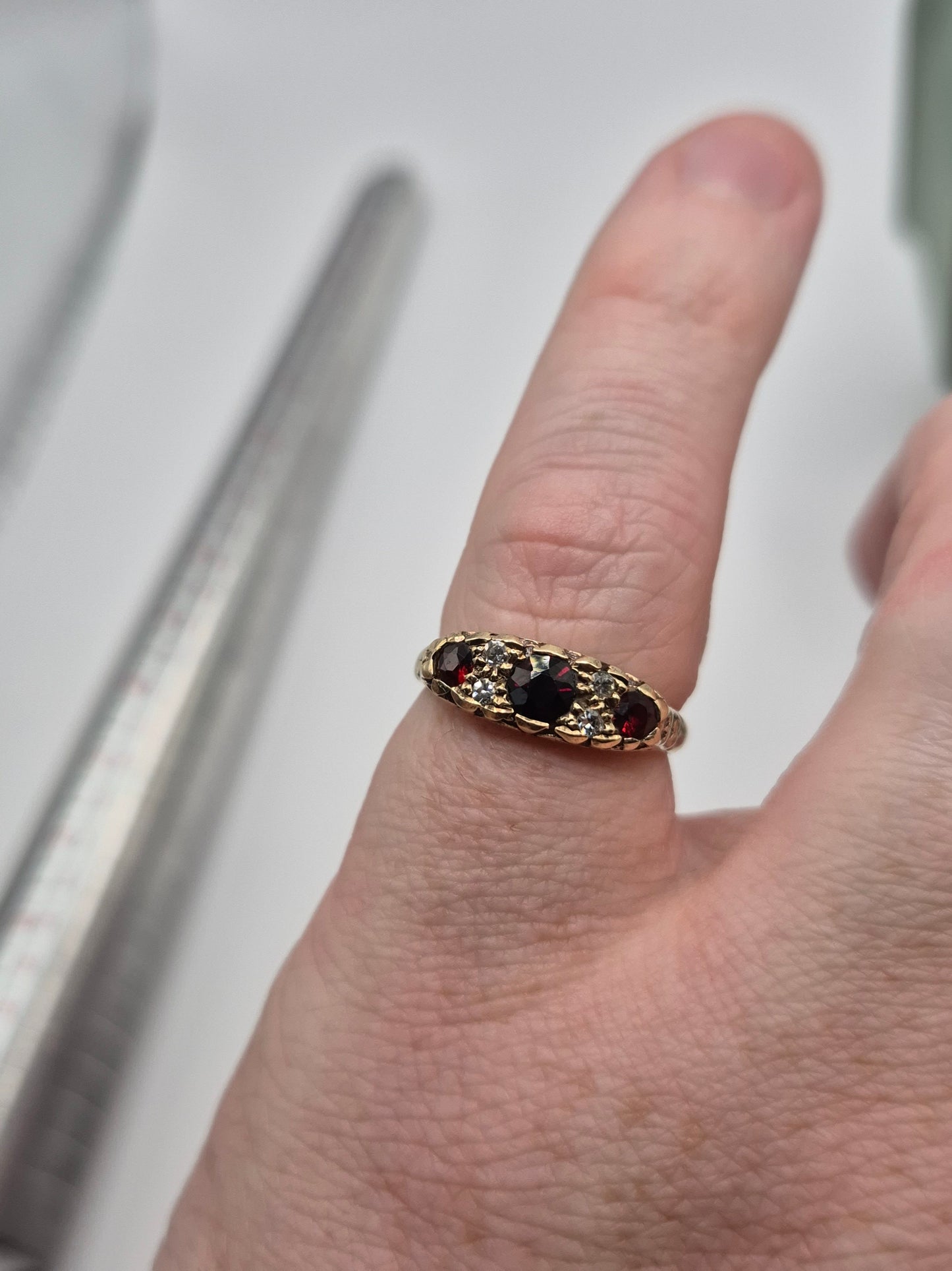 Heavy 9ct gold garnet and diamond ring