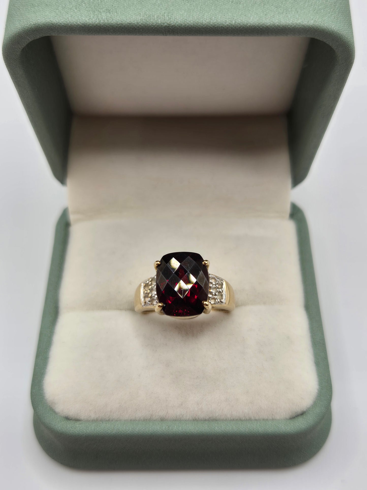 Heavy 9ct gold garnet and white topaz ring