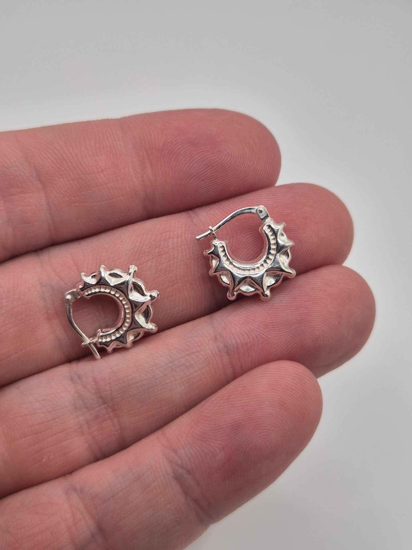 Silver creole spike earrings