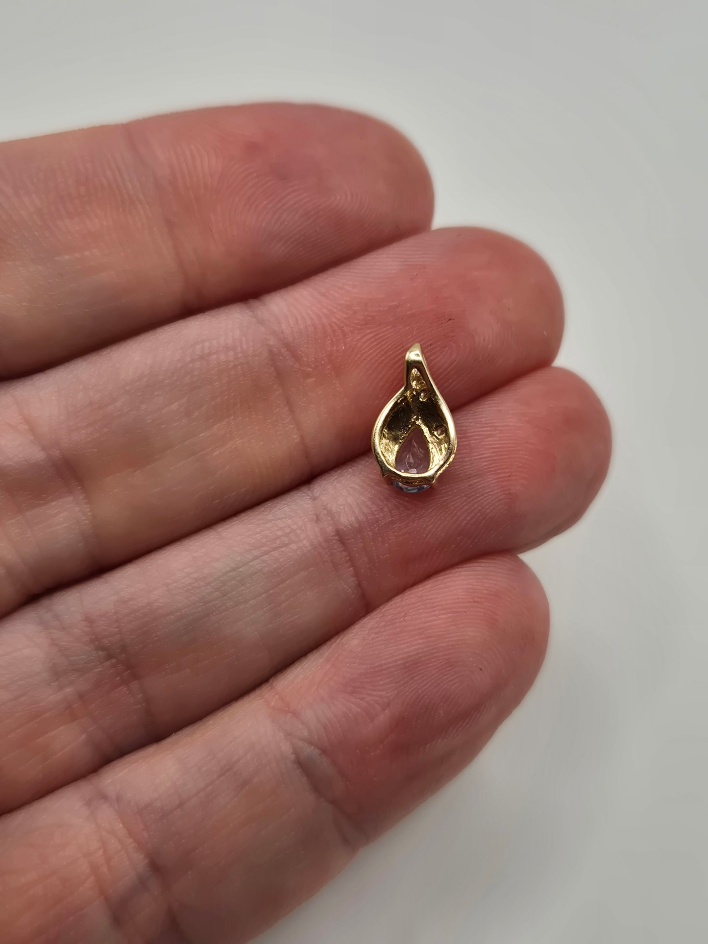 9ct gold topaz and diamond pendant