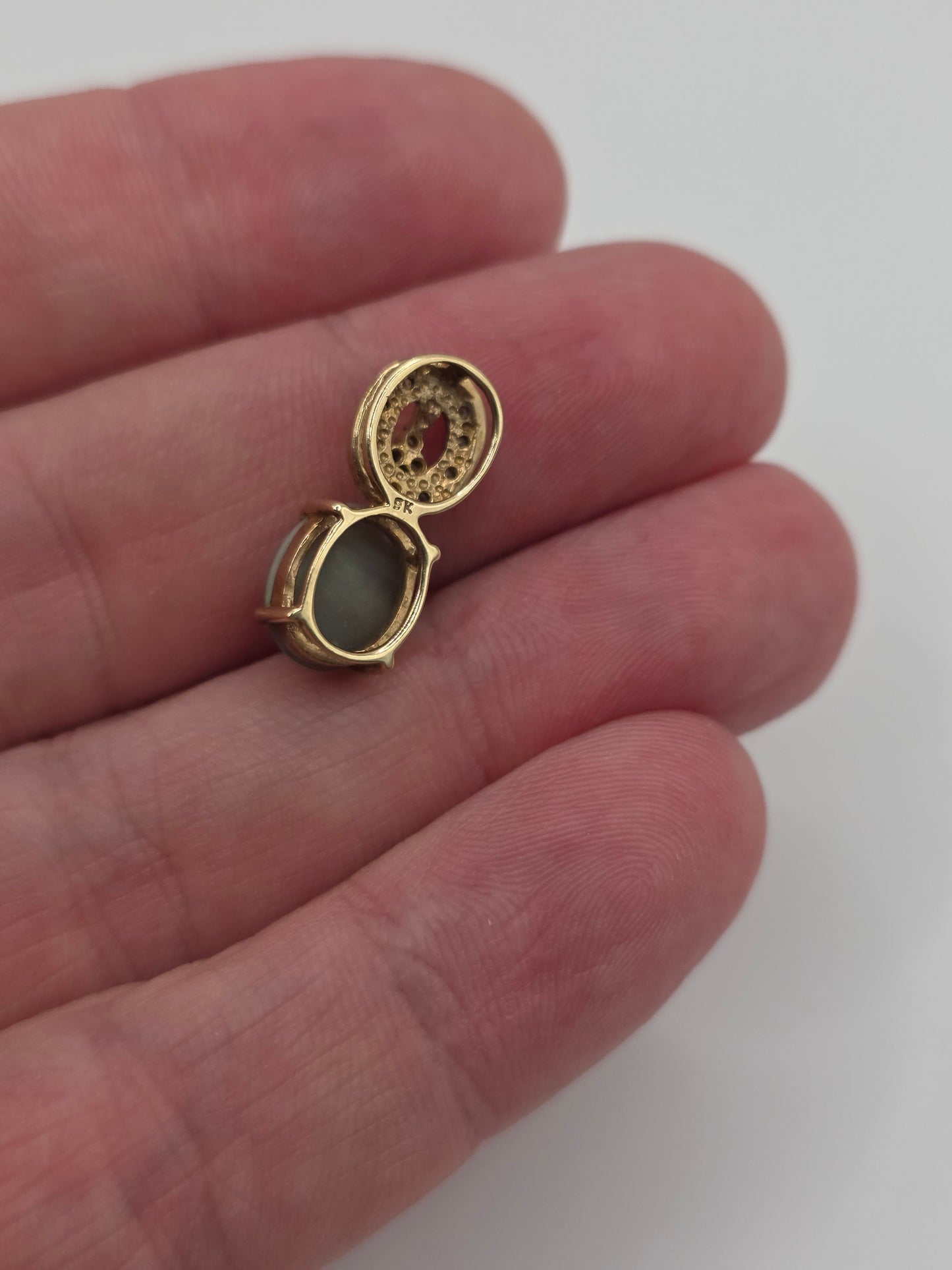 9ct gold opal and diamond pendant