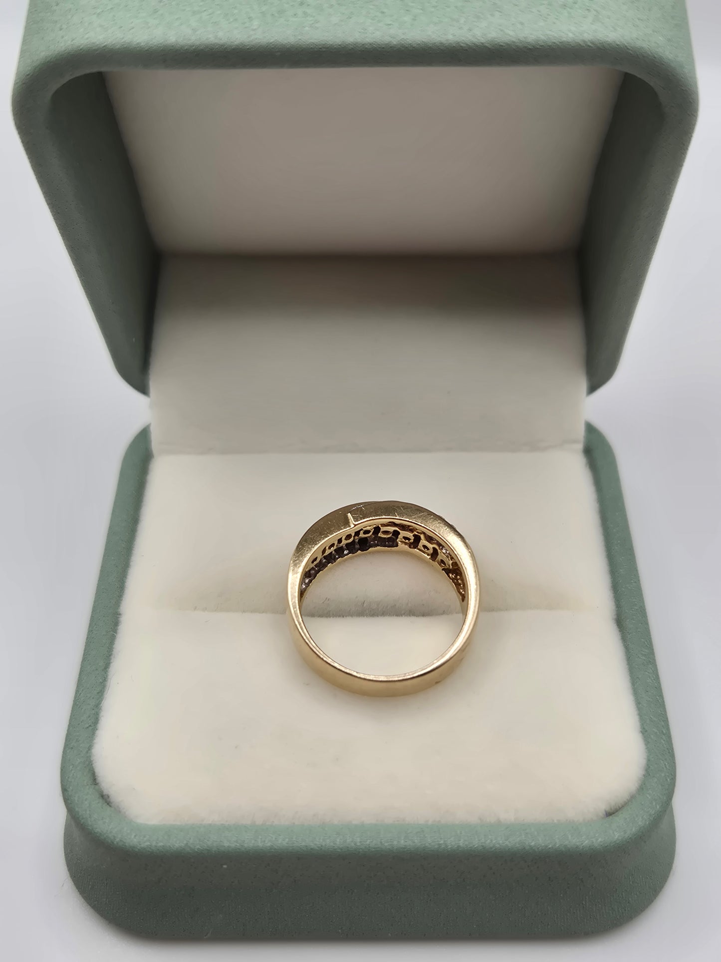 Heavy 9ct gold ruby and diamond cross over ring