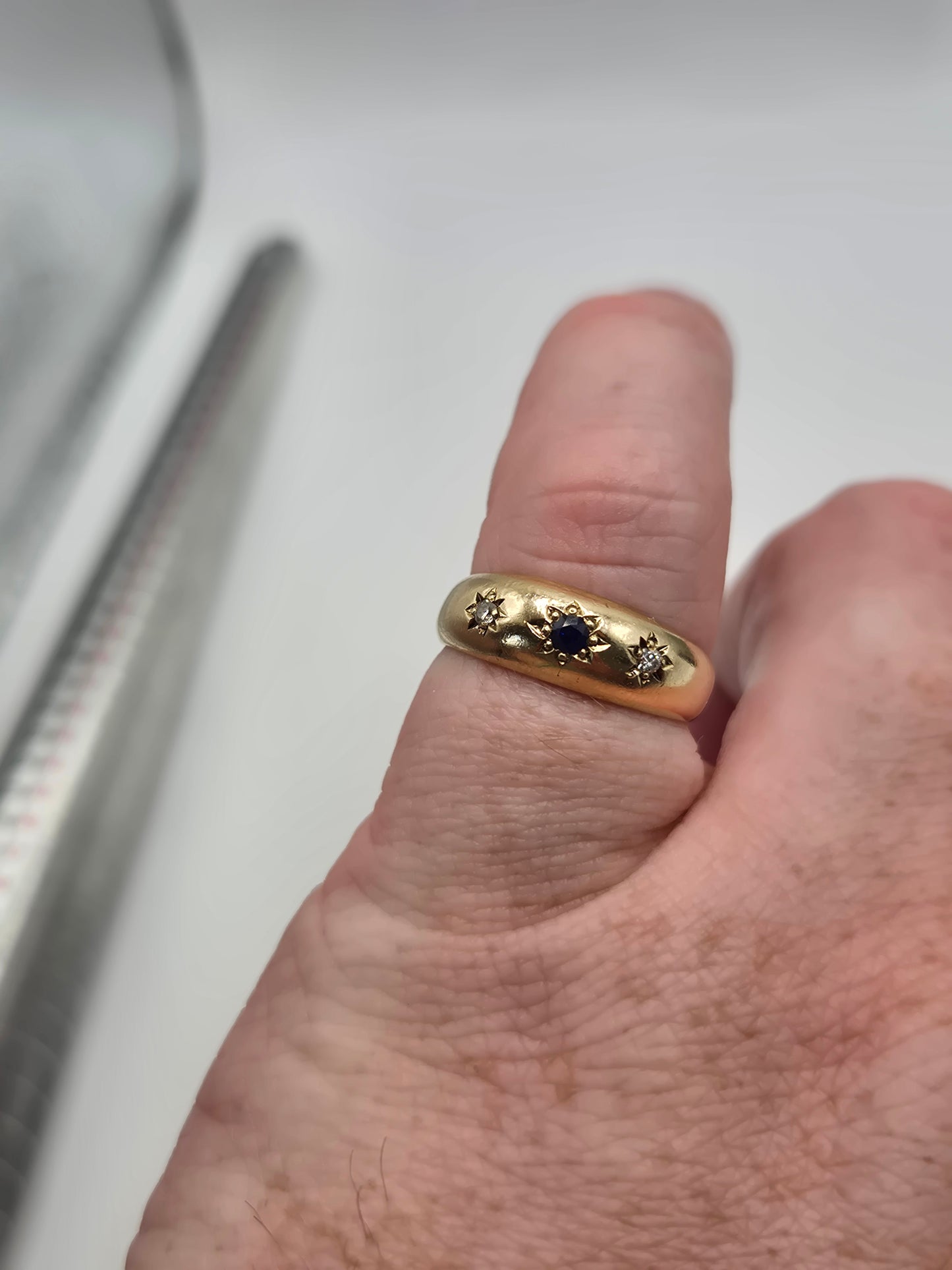 Heavy 9ct gold sapphire and diamond gypsy ring