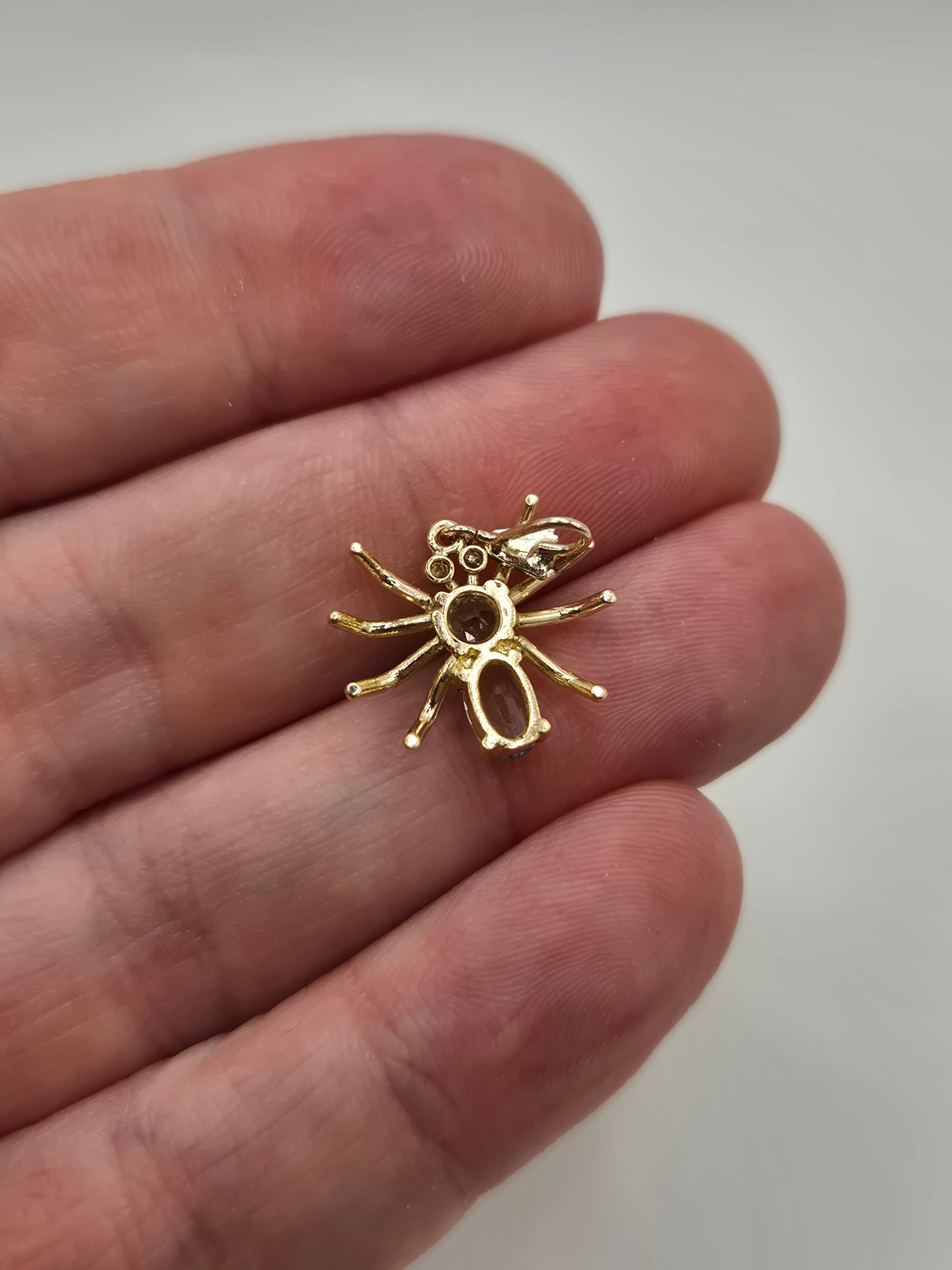 9ct gold topaz and diamond spider pendant