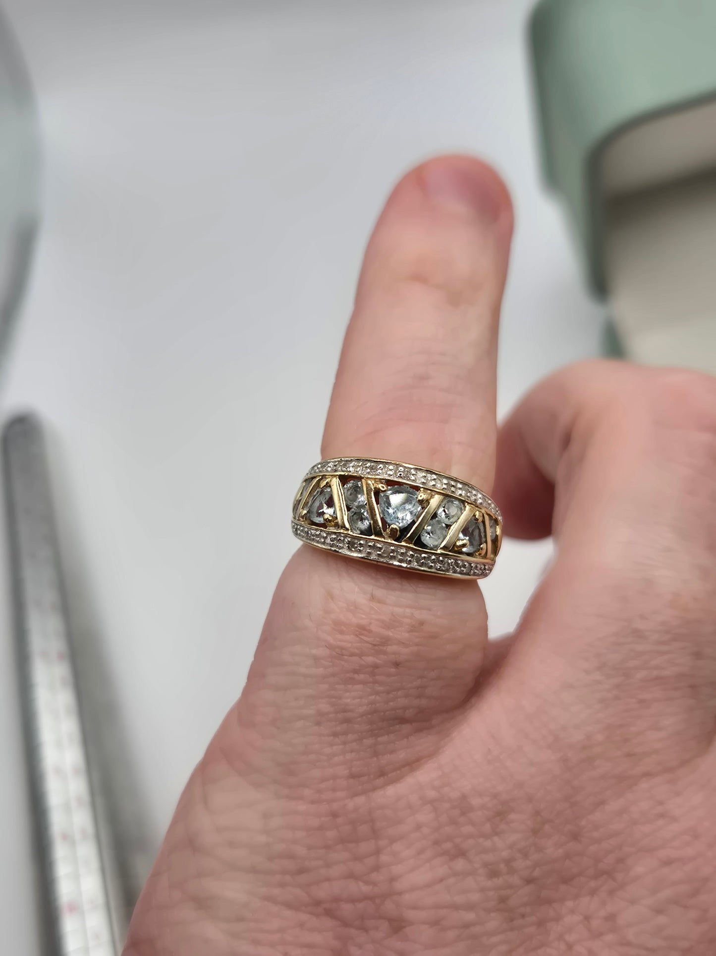Heavy 9ct gold aquamarine and diamond ring