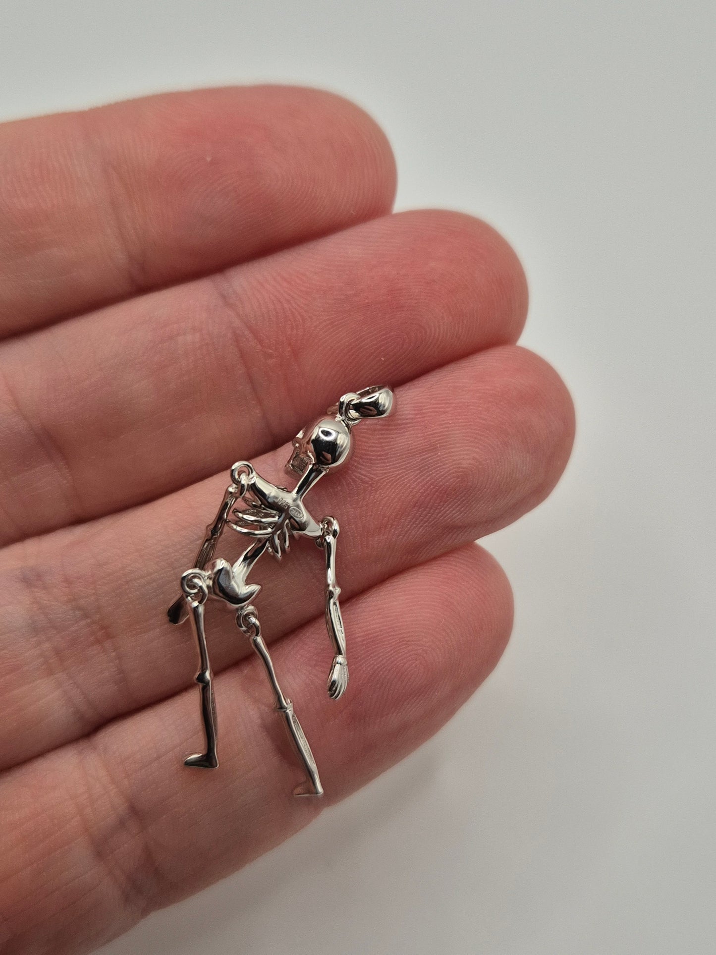 Silver skeleton pendant