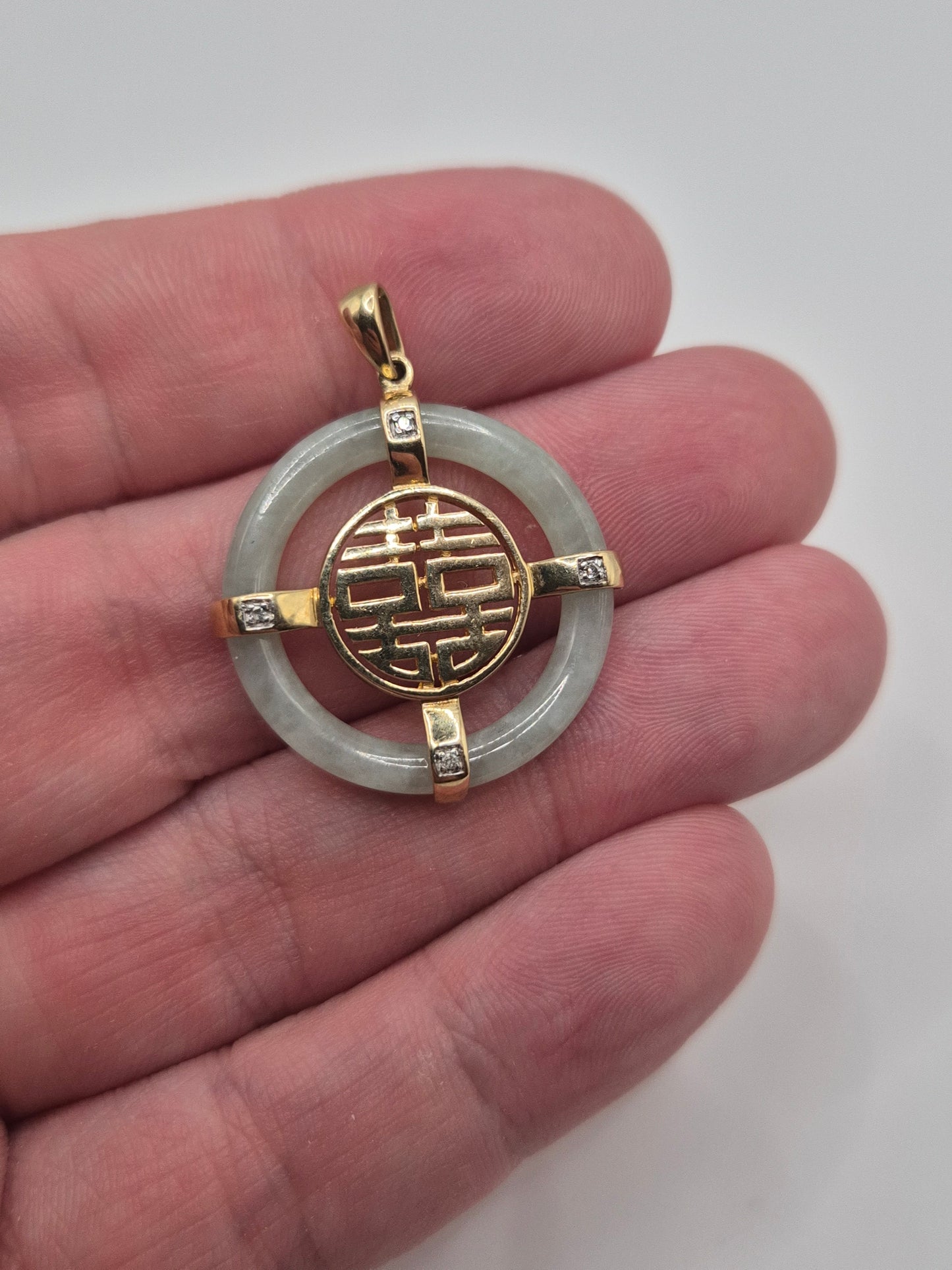 9ct gold jade and diamond pendant