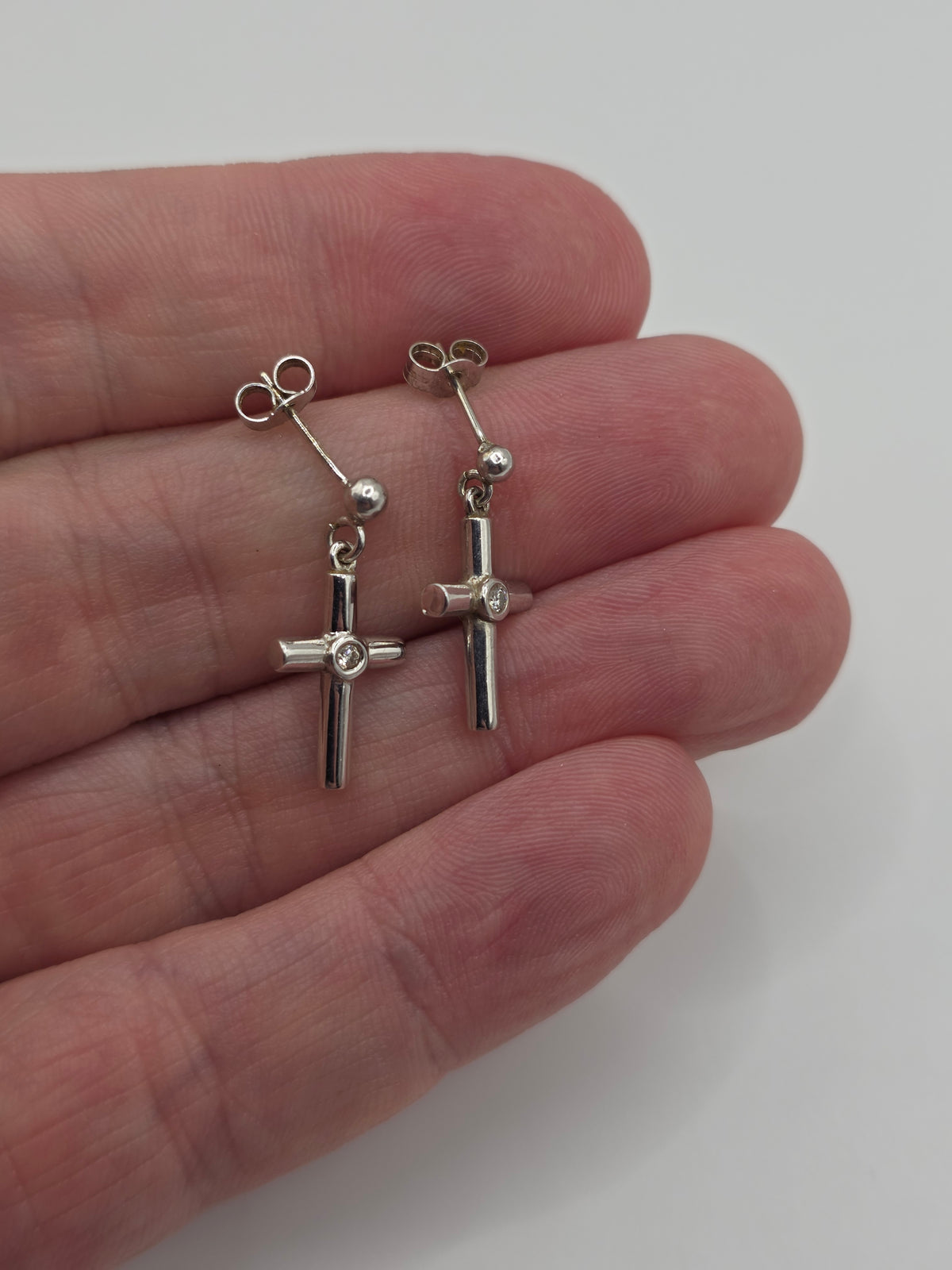 Heavy 9ct white gold diamond cross earrings