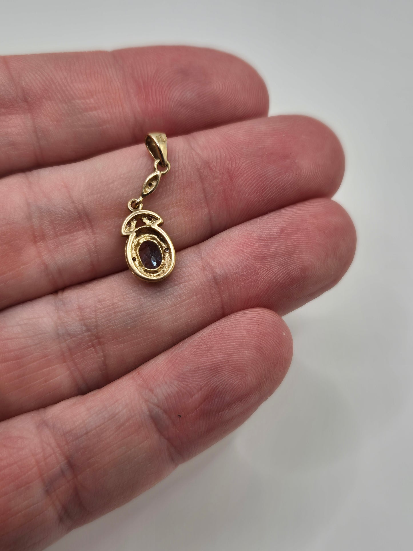 9ct gold topaz and diamond pendant