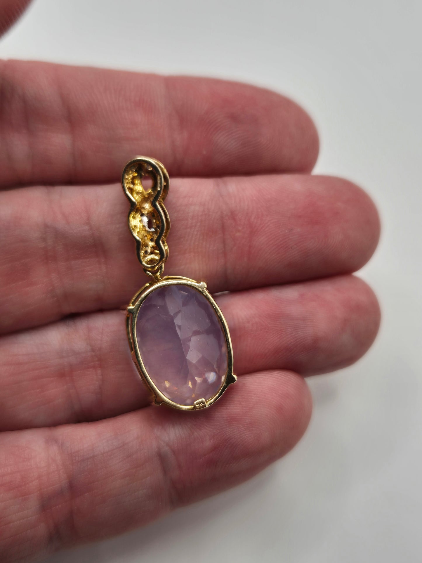9ct gold rose quartz and diamond pendant