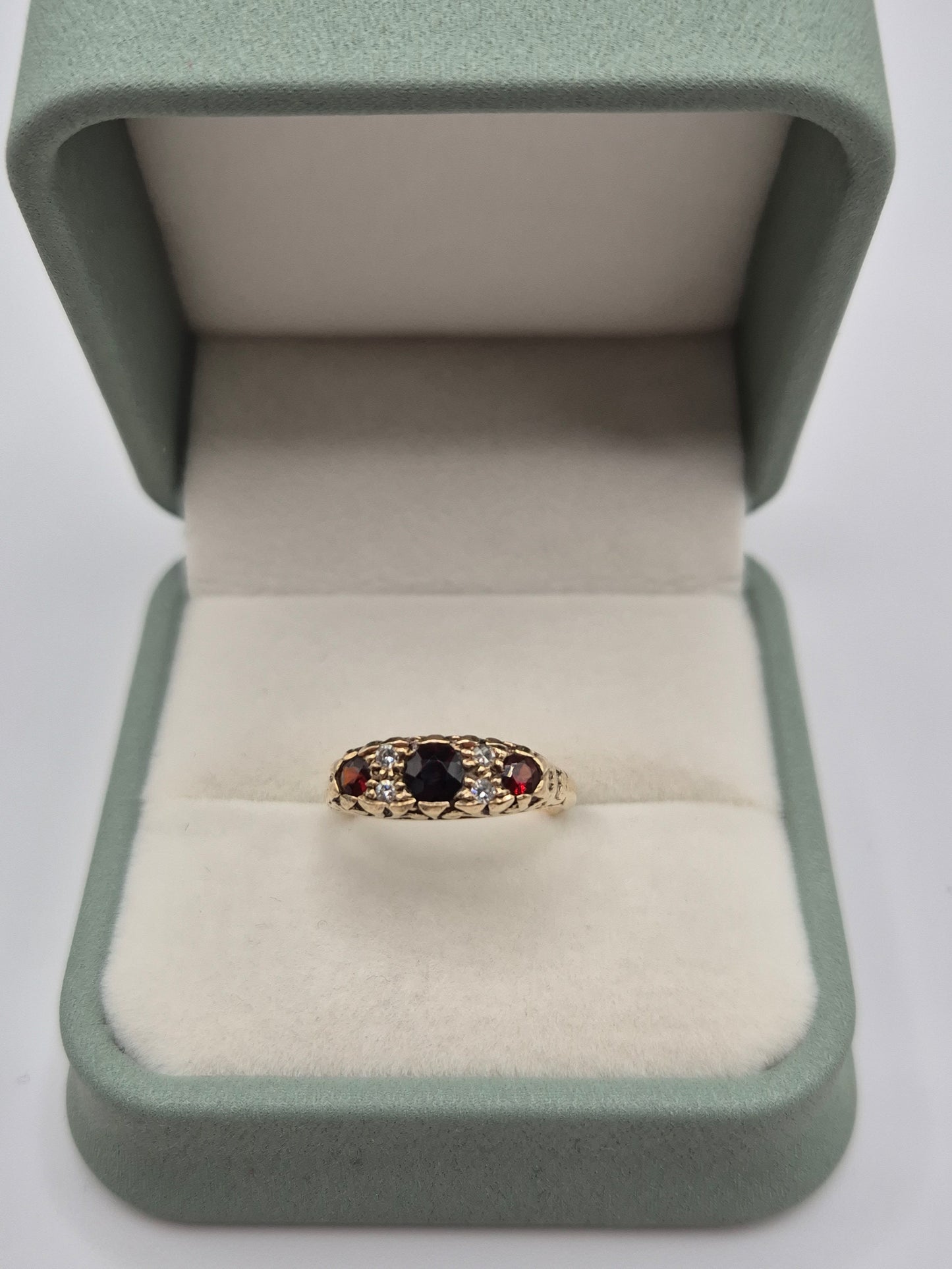 Heavy 9ct gold garnet and diamond ring