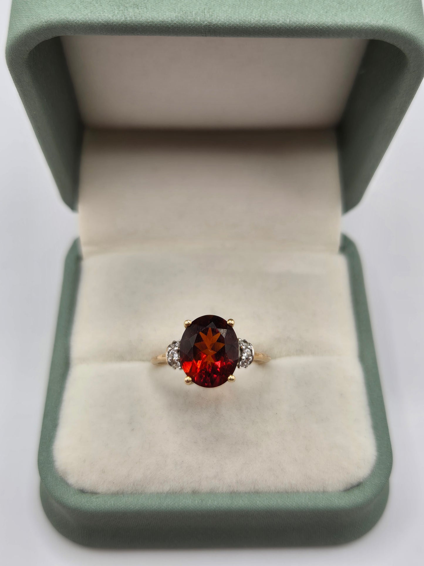9ct gold garnet and white zircon ring