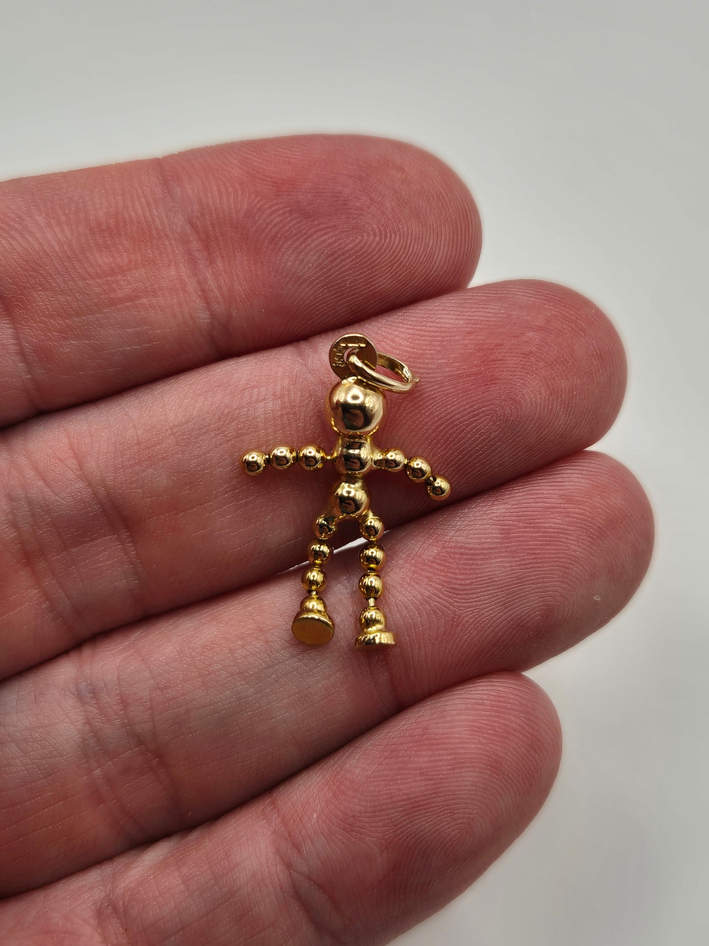 9ct gold doll pendant