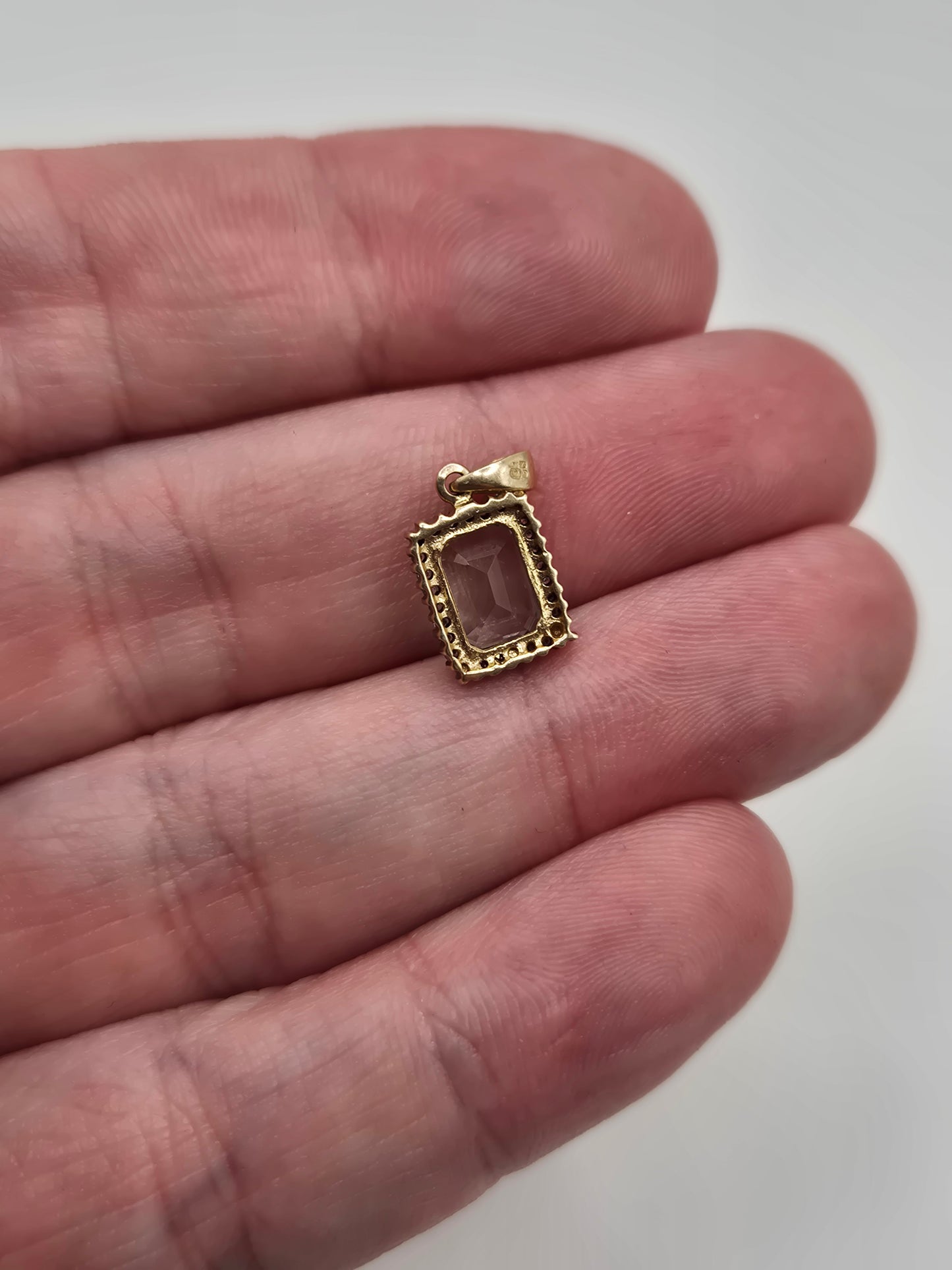 9ct gold topaz and diamond pendant