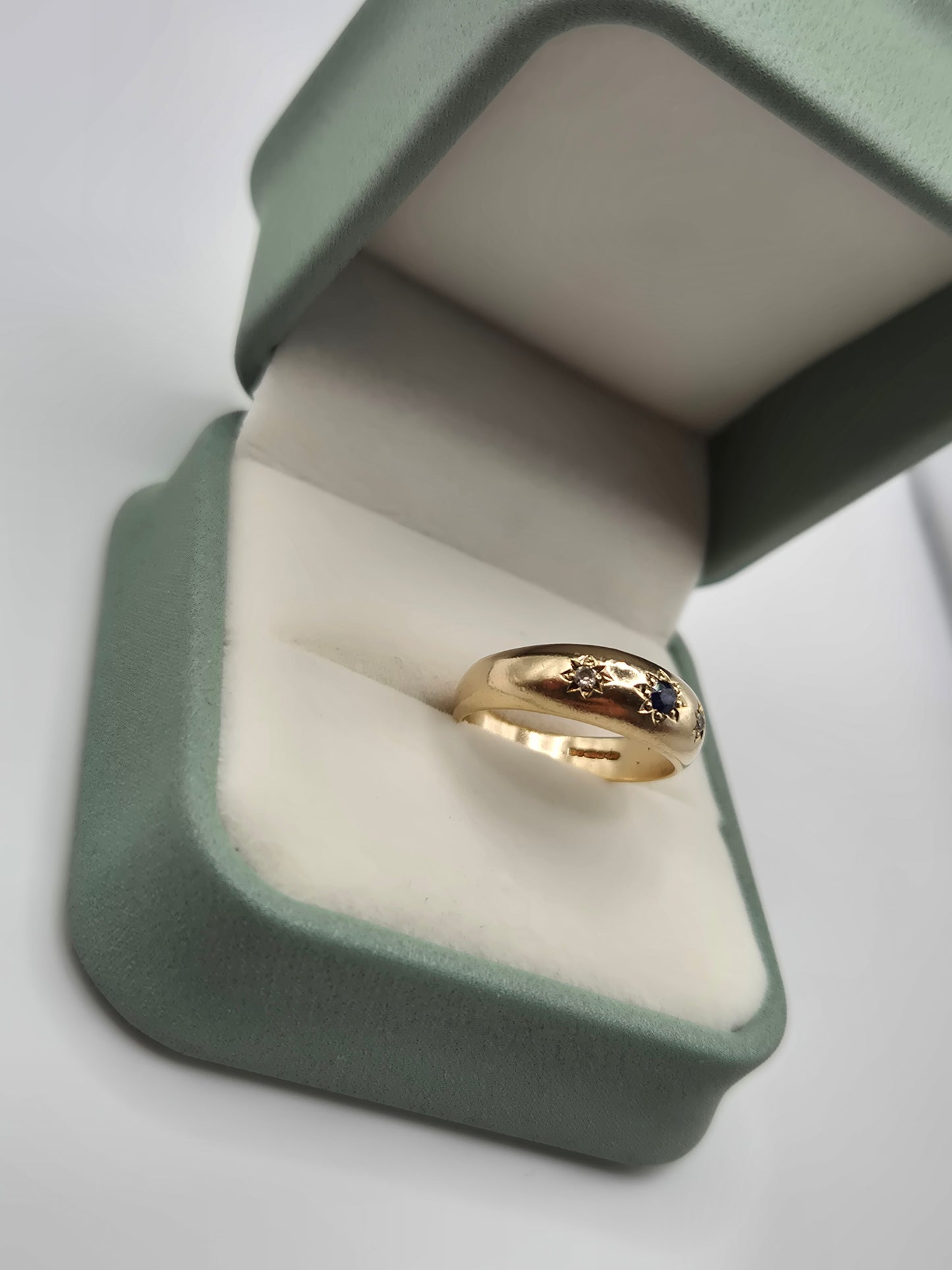 Heavy 9ct gold sapphire and diamond gypsy ring