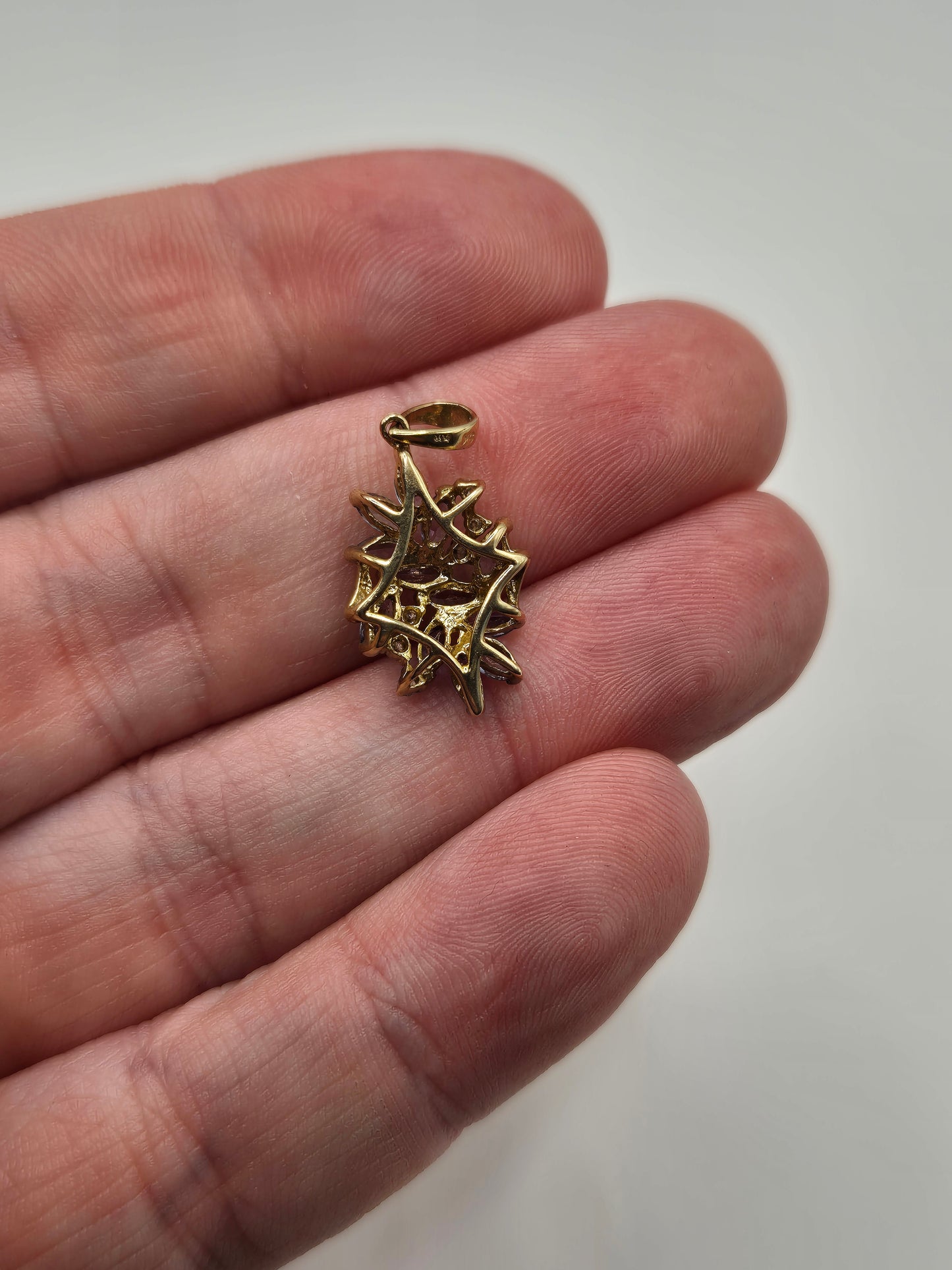 9ct gold tanzanite and diamond pendant