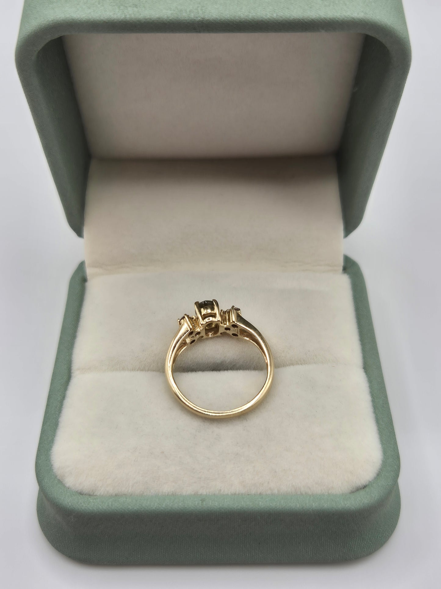 9ct gold green sapphire and white zircon ring