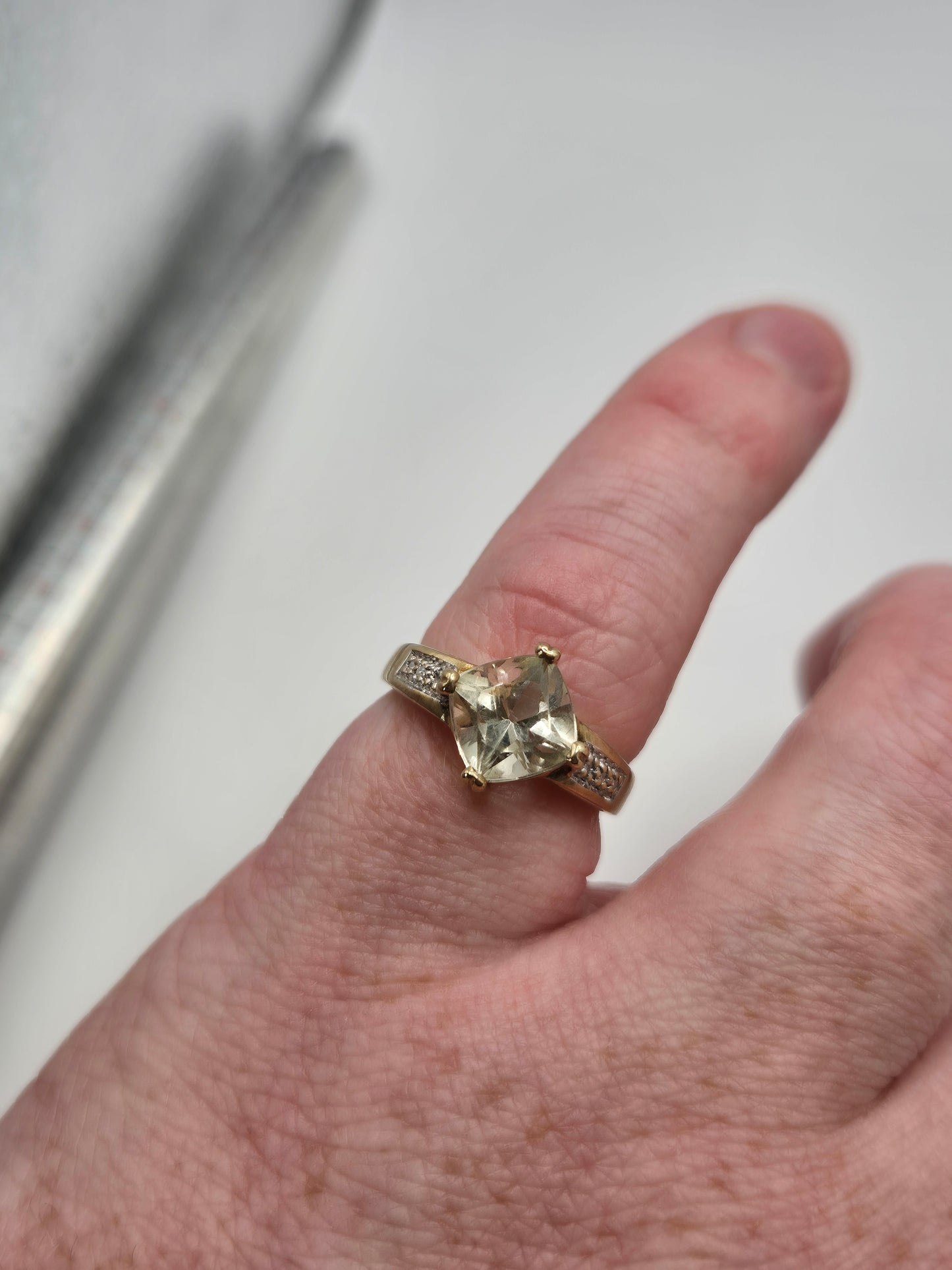 Heavy 9ct gold peridot and diamond ring