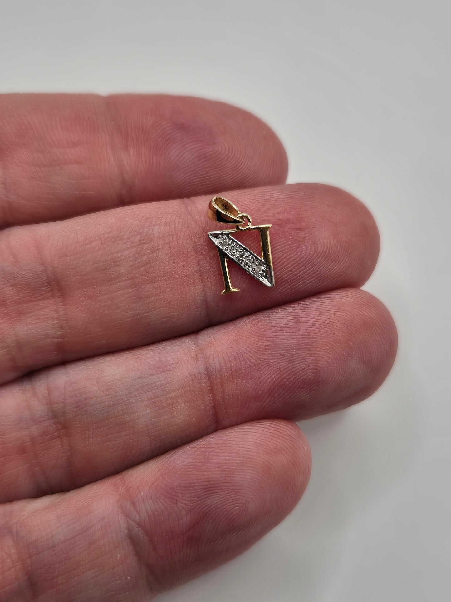 9ct gold initial N diamond pendant