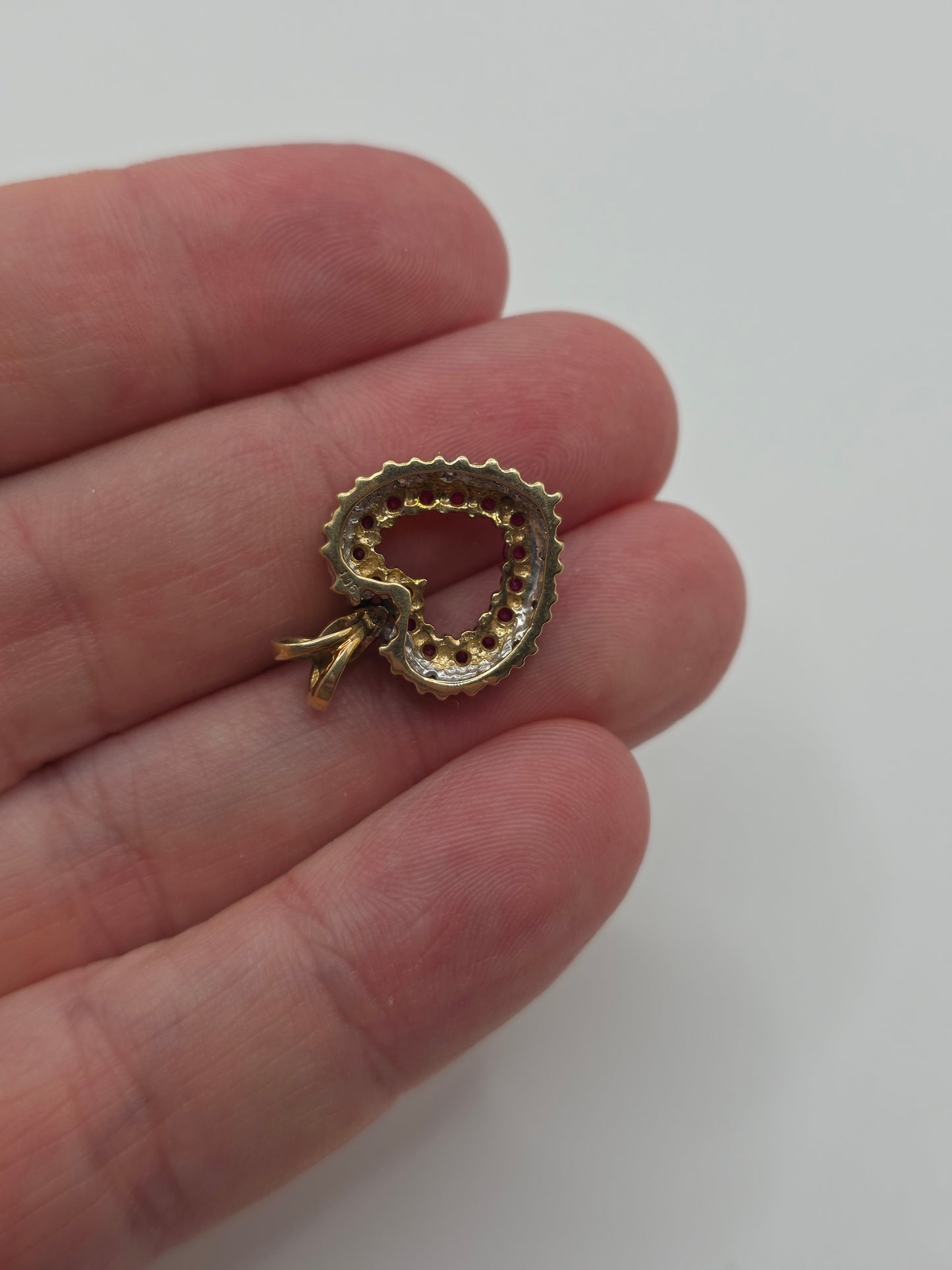 Heavy 9ct gold ruby and diamond heart pendant