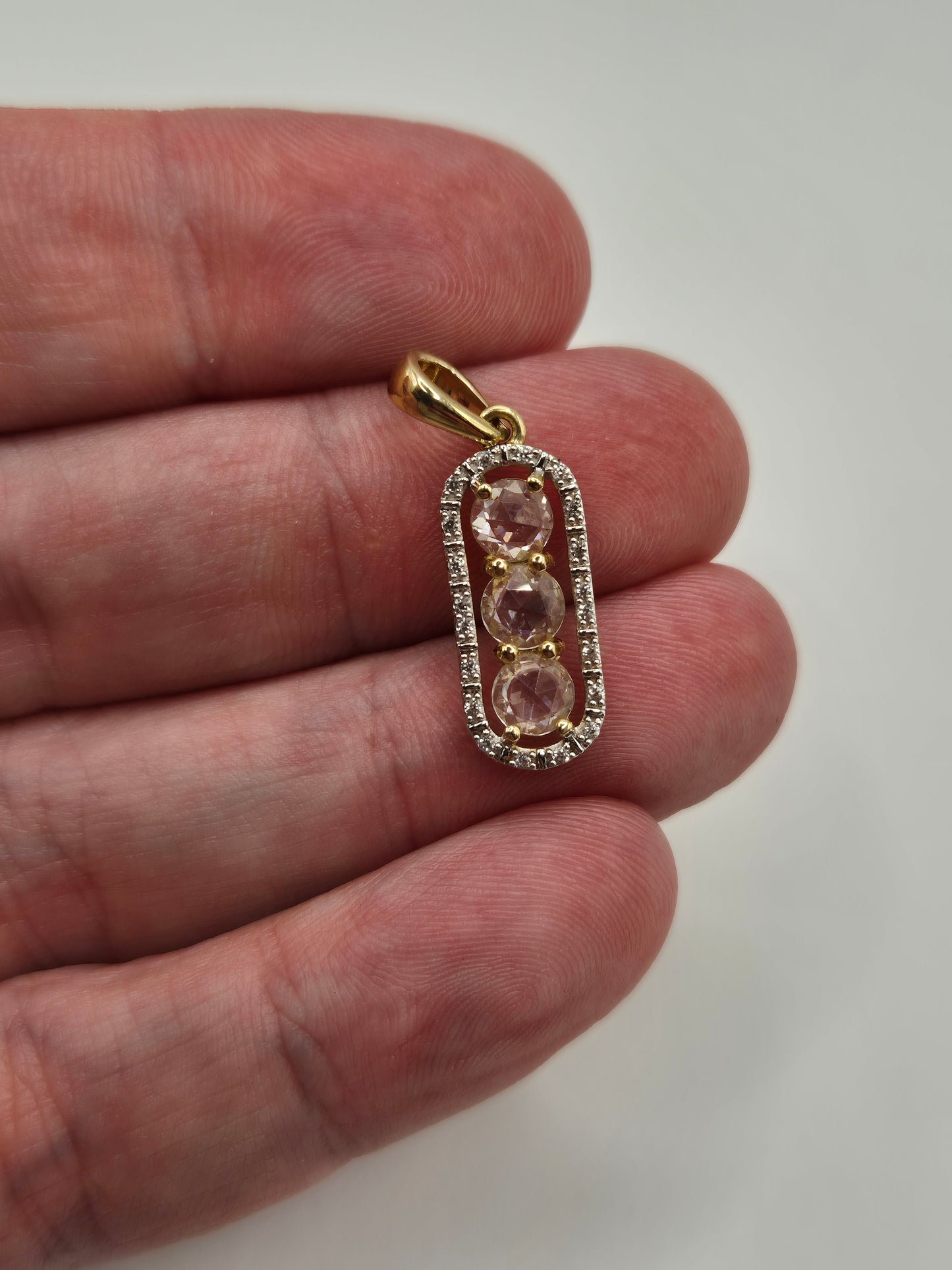 9ct gold quartz and zircon pendant