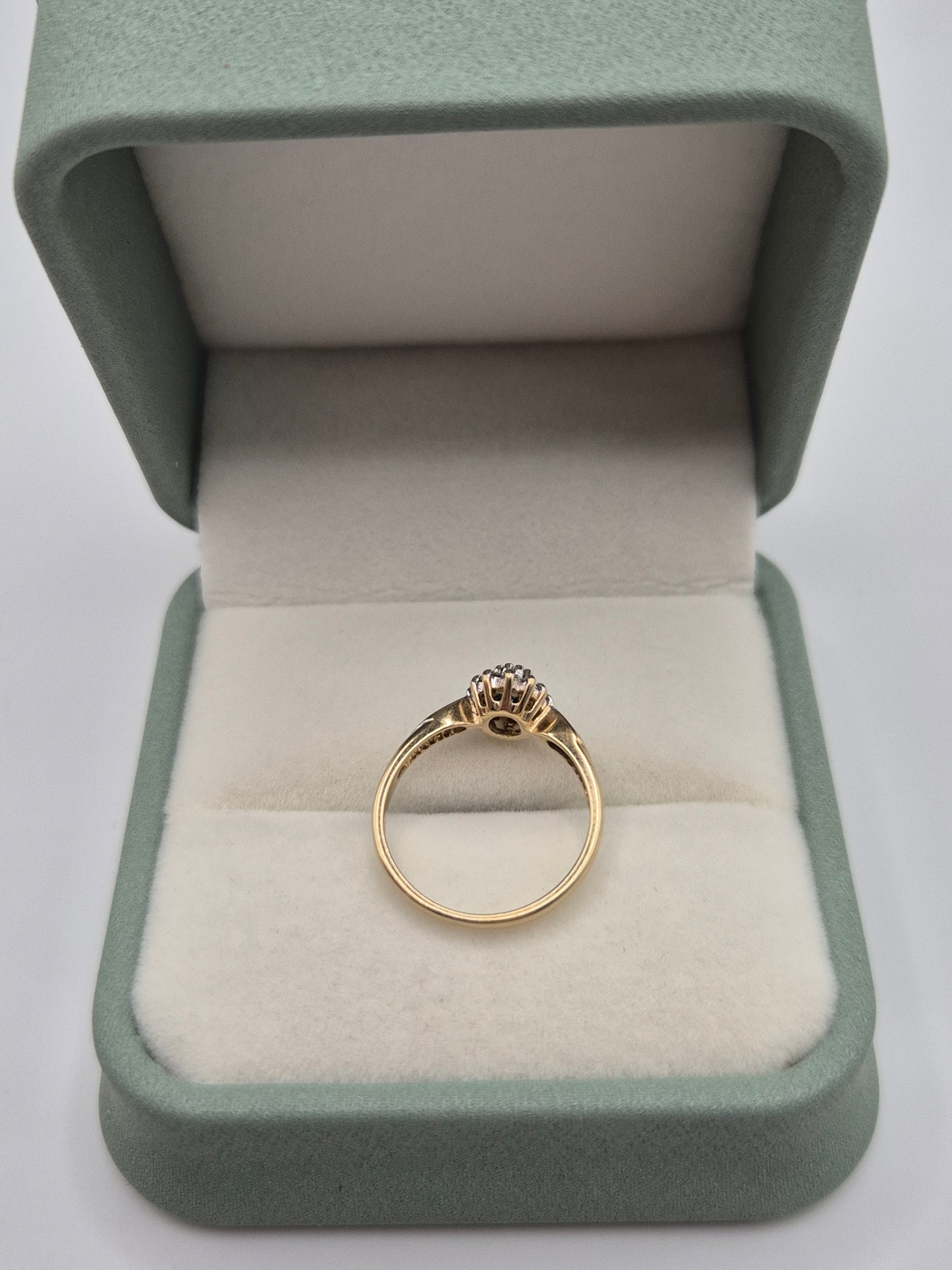9ct gold simulated emerald and diamond ring