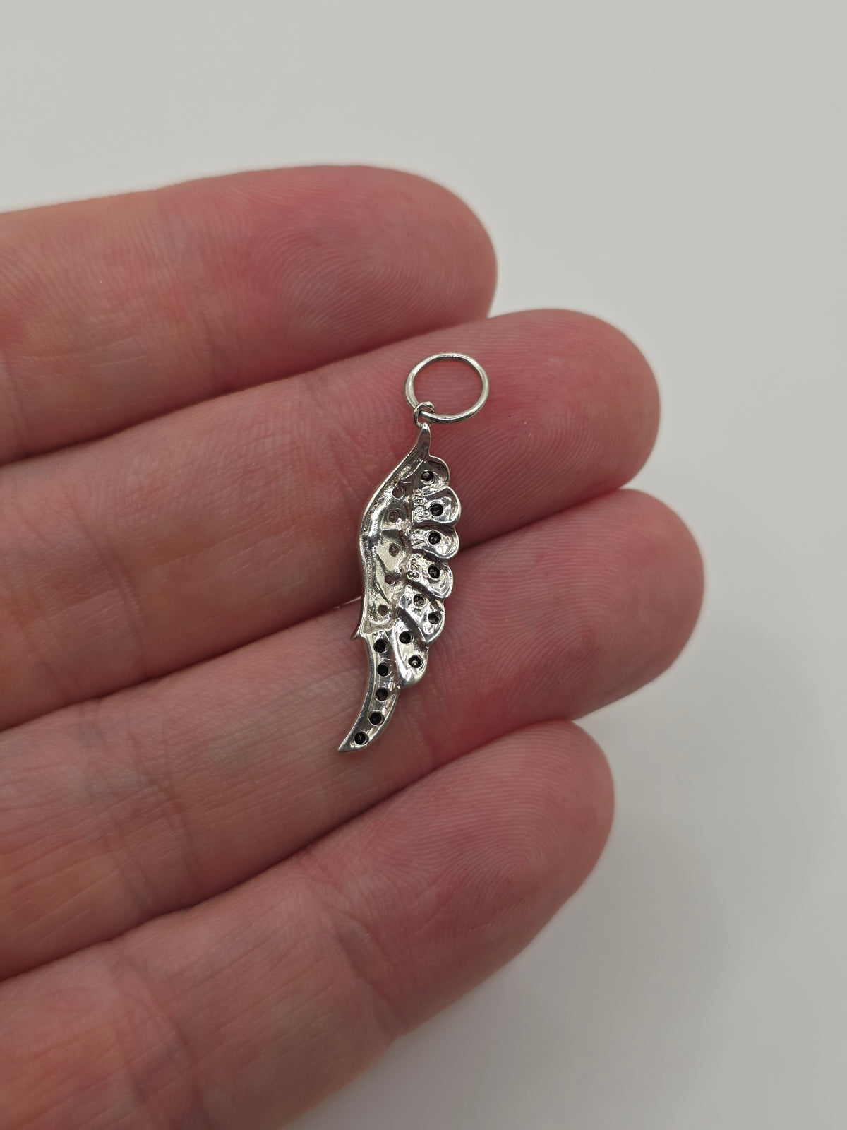 9ct white gold diamond wing pendant