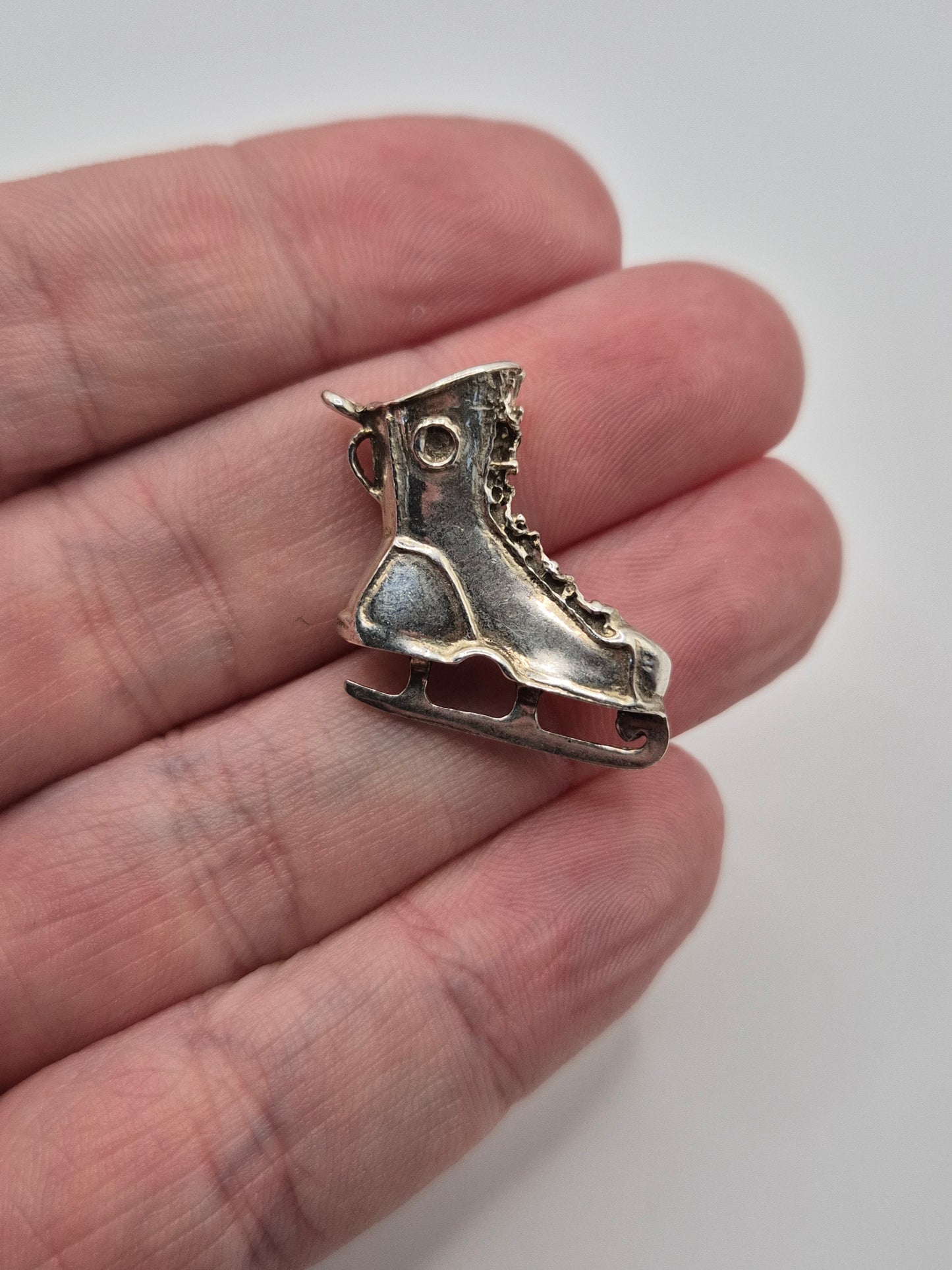 Silver ice skate charm