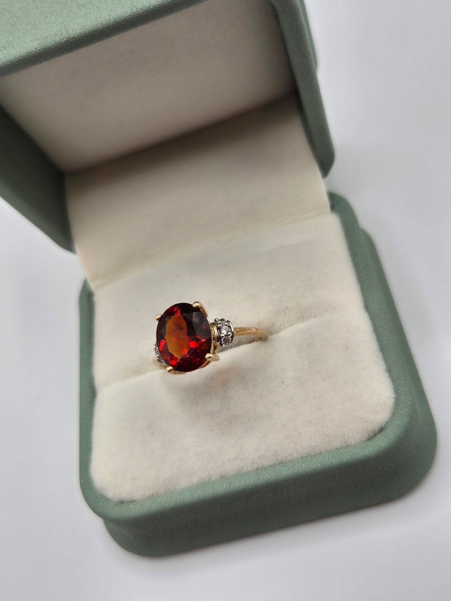 9ct gold garnet and white zircon ring