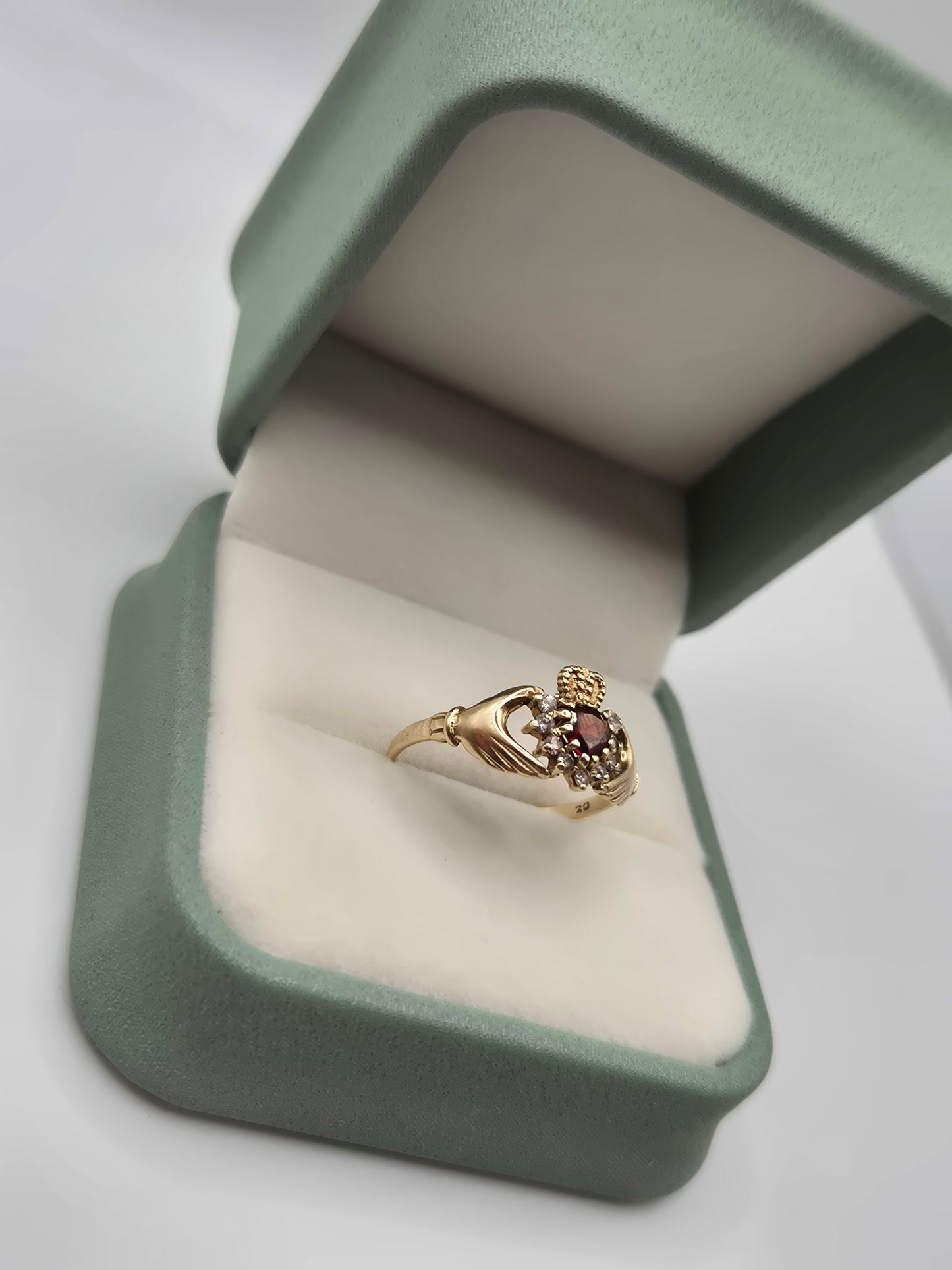 9ct gold garnet and cz claddagh ring
