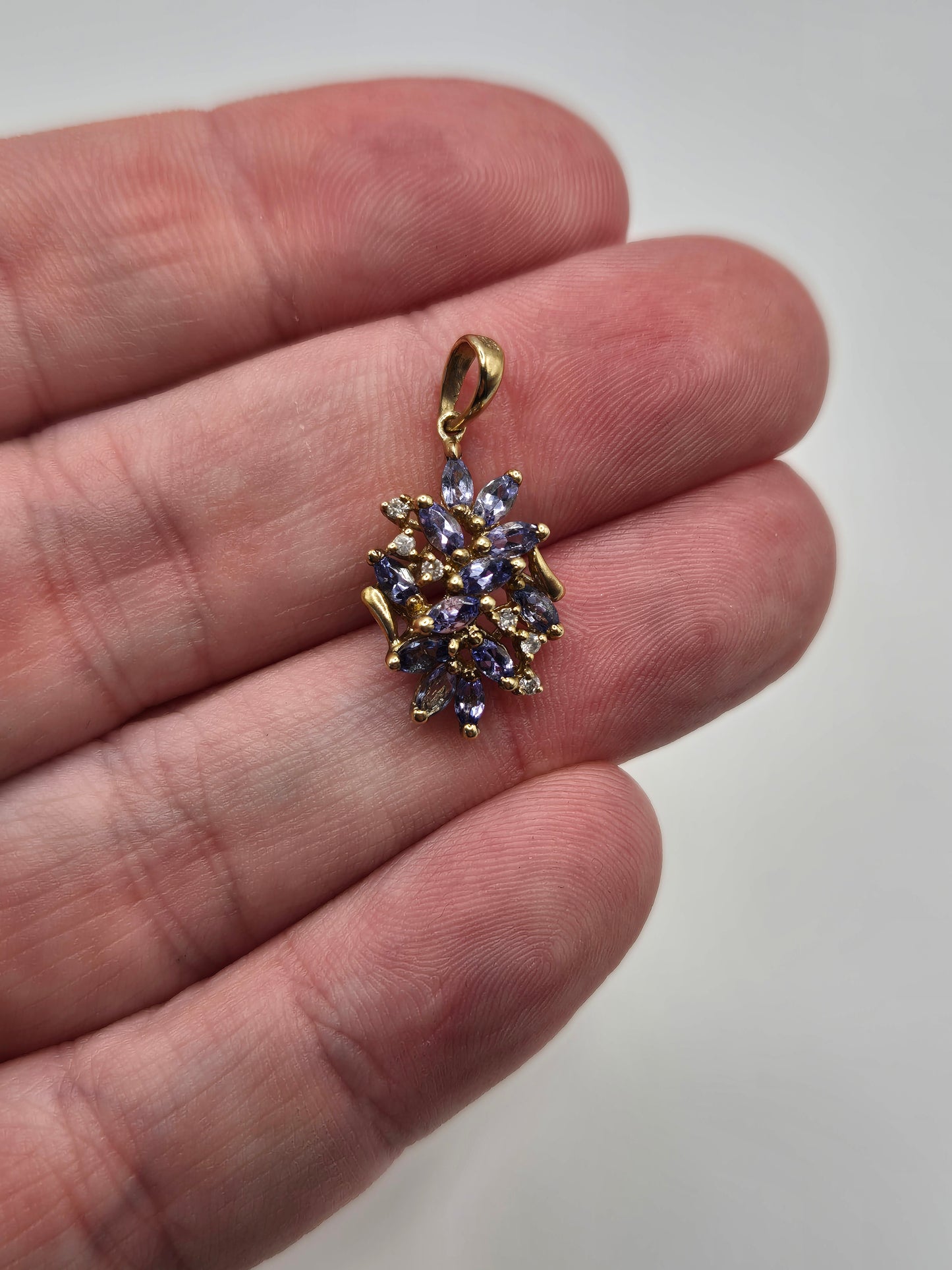 9ct gold tanzanite and diamond pendant