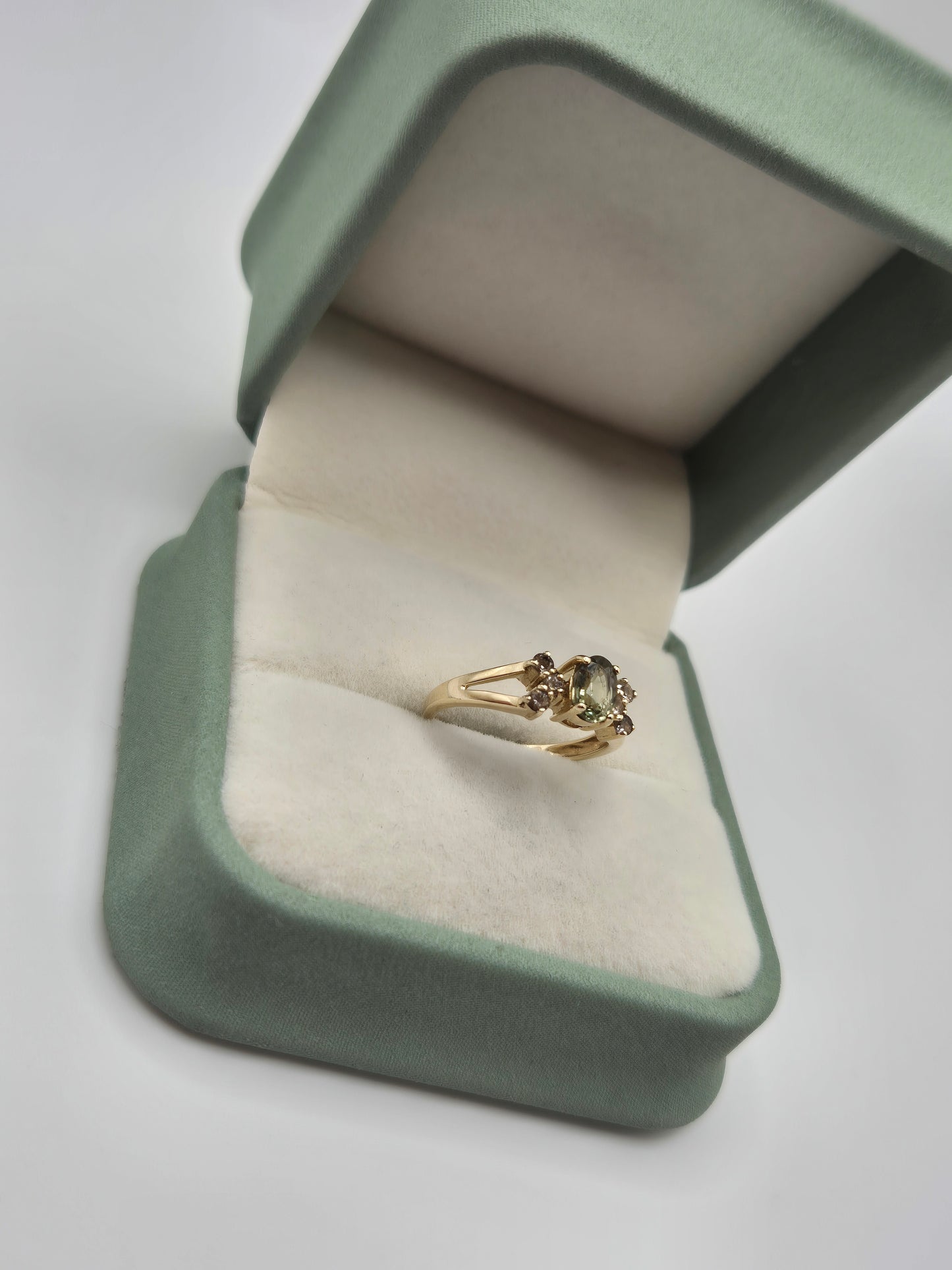 9ct gold green sapphire and white zircon ring