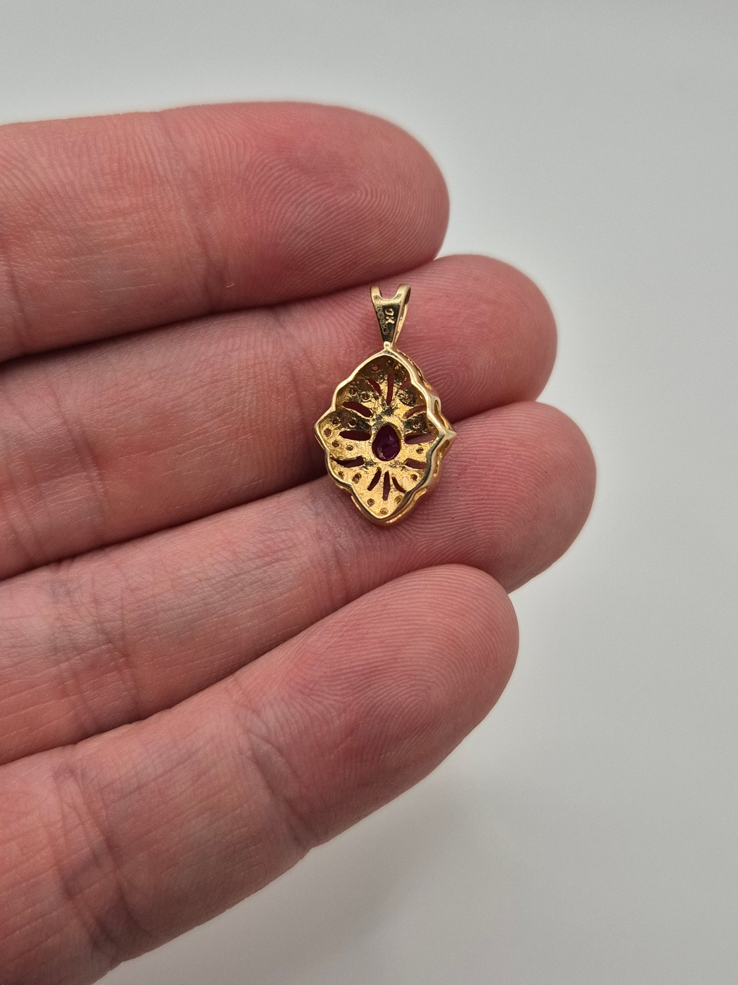 9ct gold ruby and diamond pendant