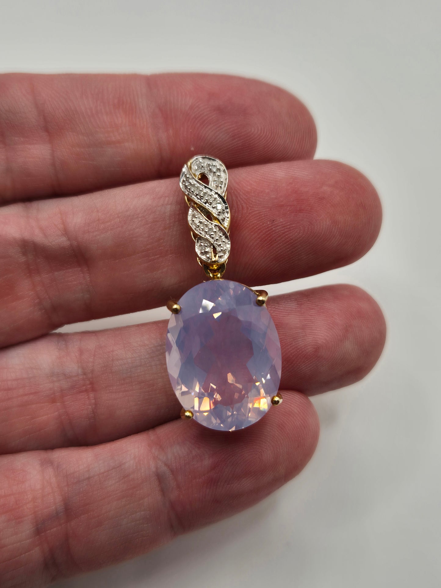 9ct gold rose quartz and diamond pendant
