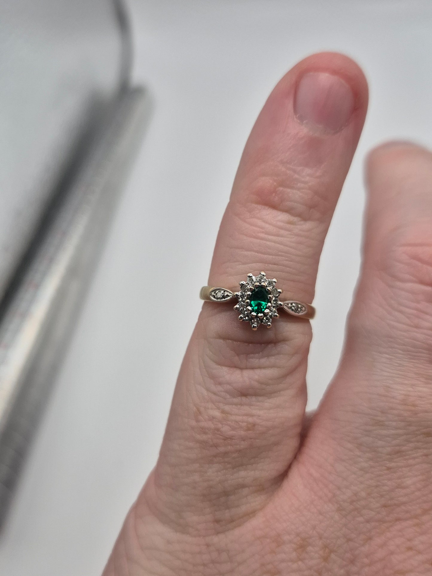 9ct gold simulated emerald and diamond ring