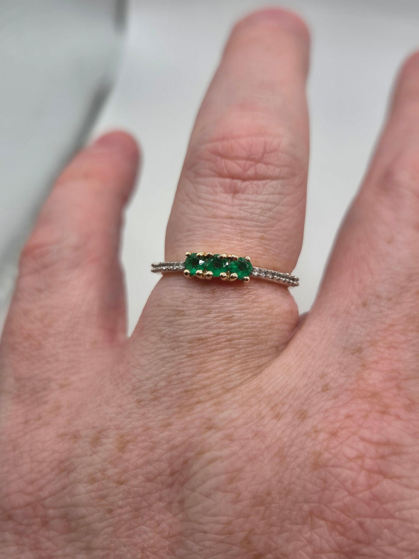9ct gold emerald and zircon ring