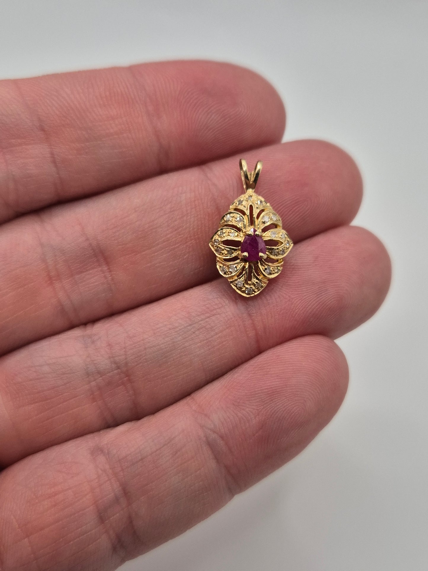 9ct gold ruby and diamond pendant
