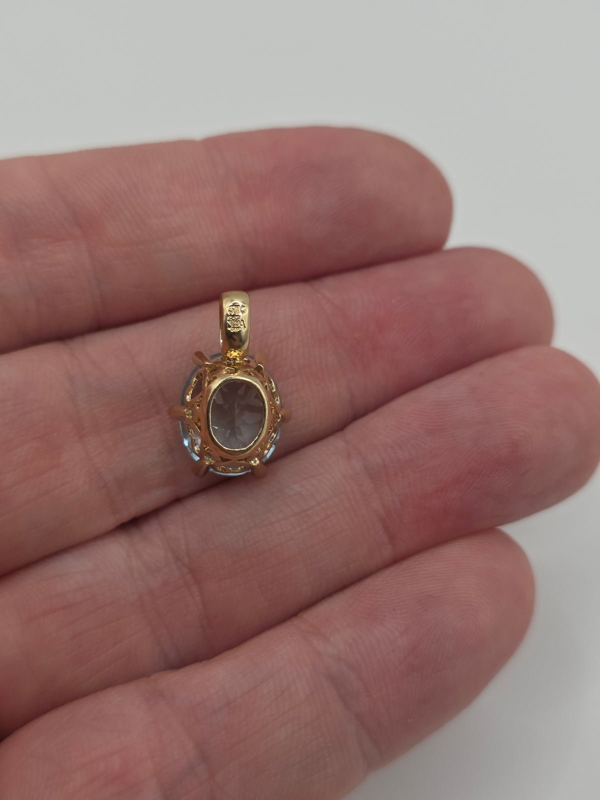 9ct gold topaz and diamond pendant