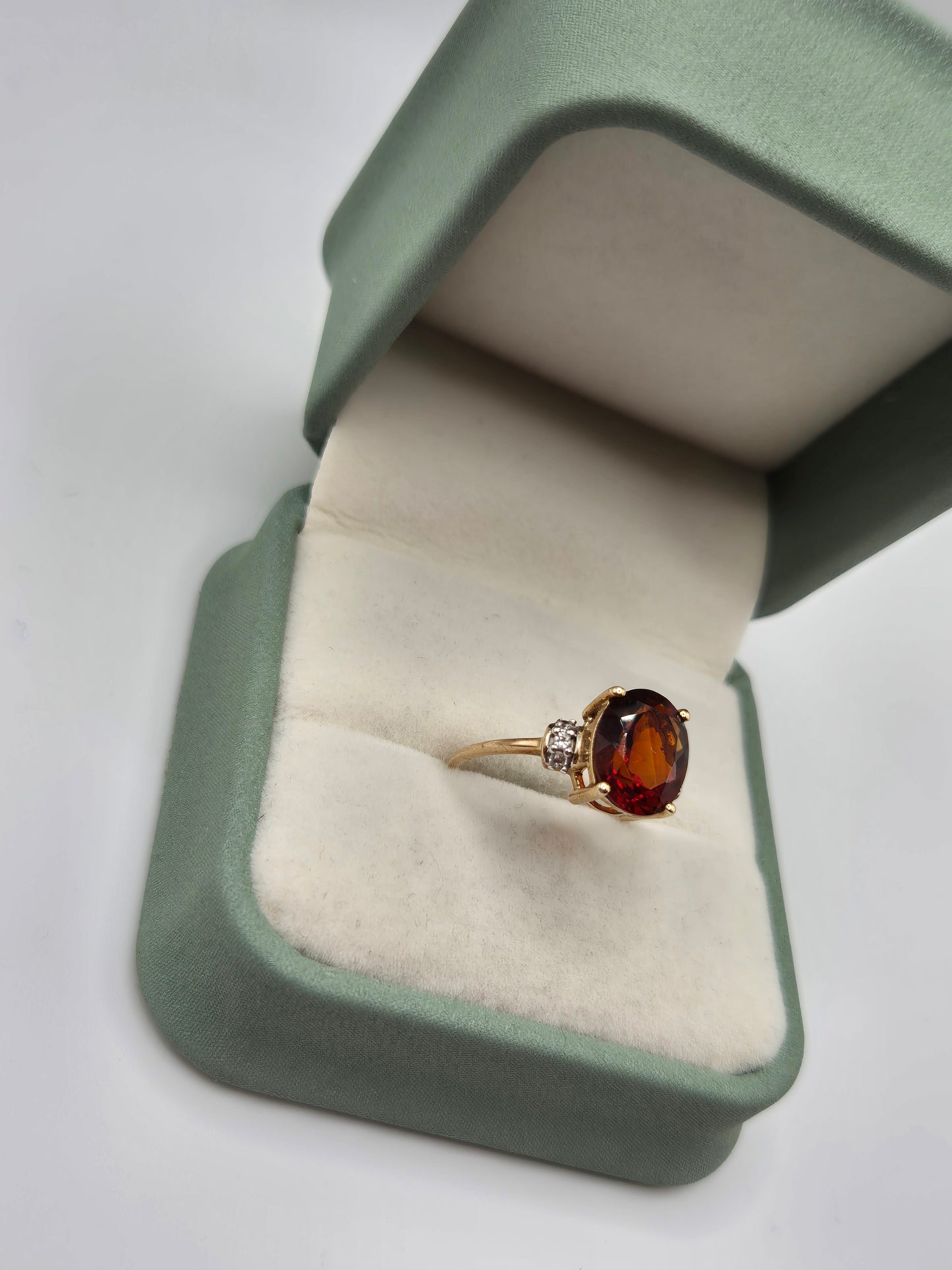 9ct gold garnet and white zircon ring