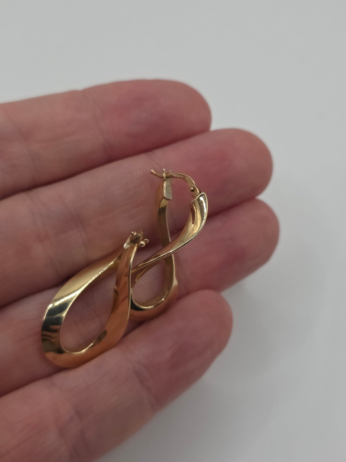 9ct gold twisted creole earrings