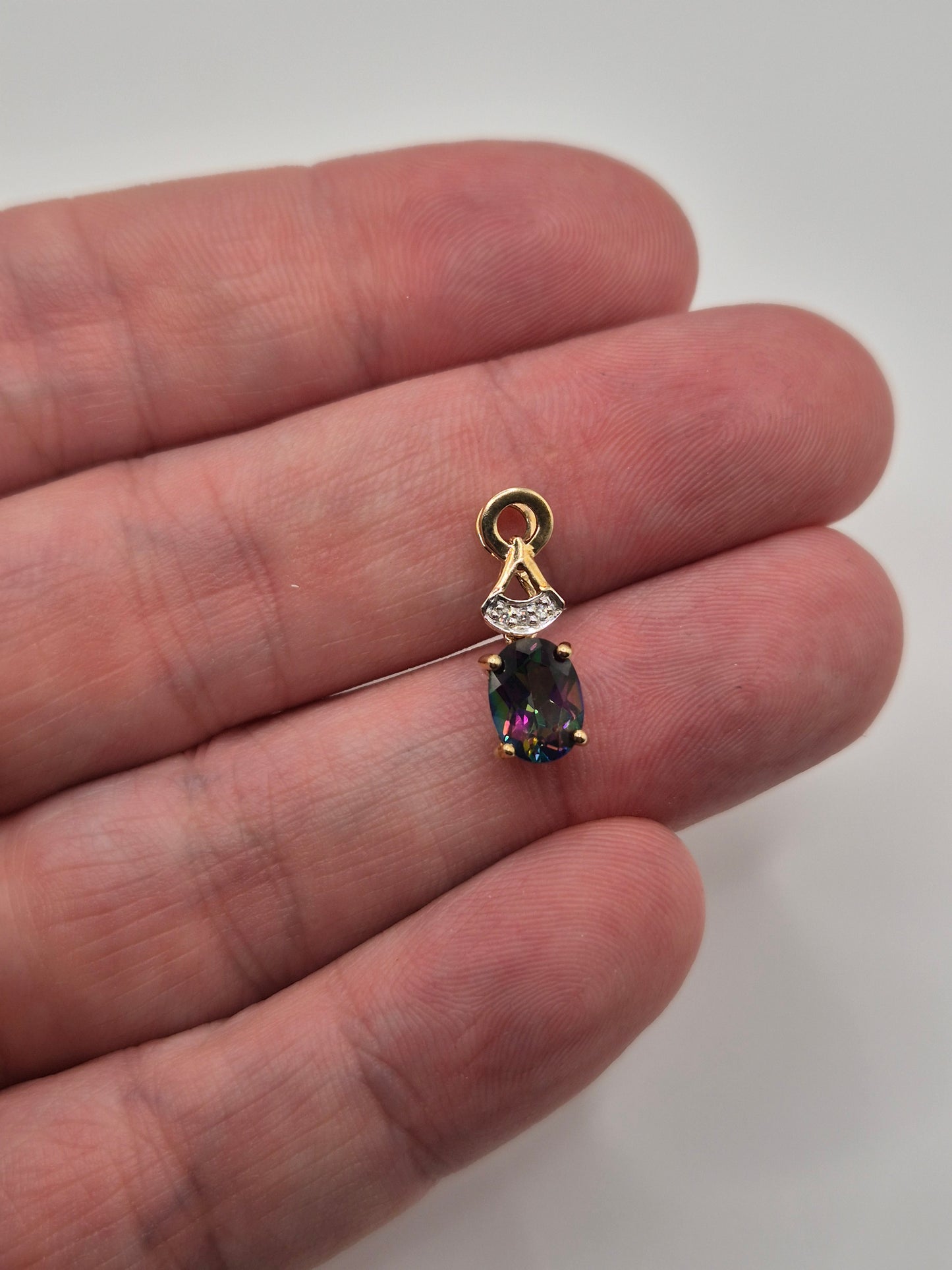 9ct gold mystic topaz and diamond pendant