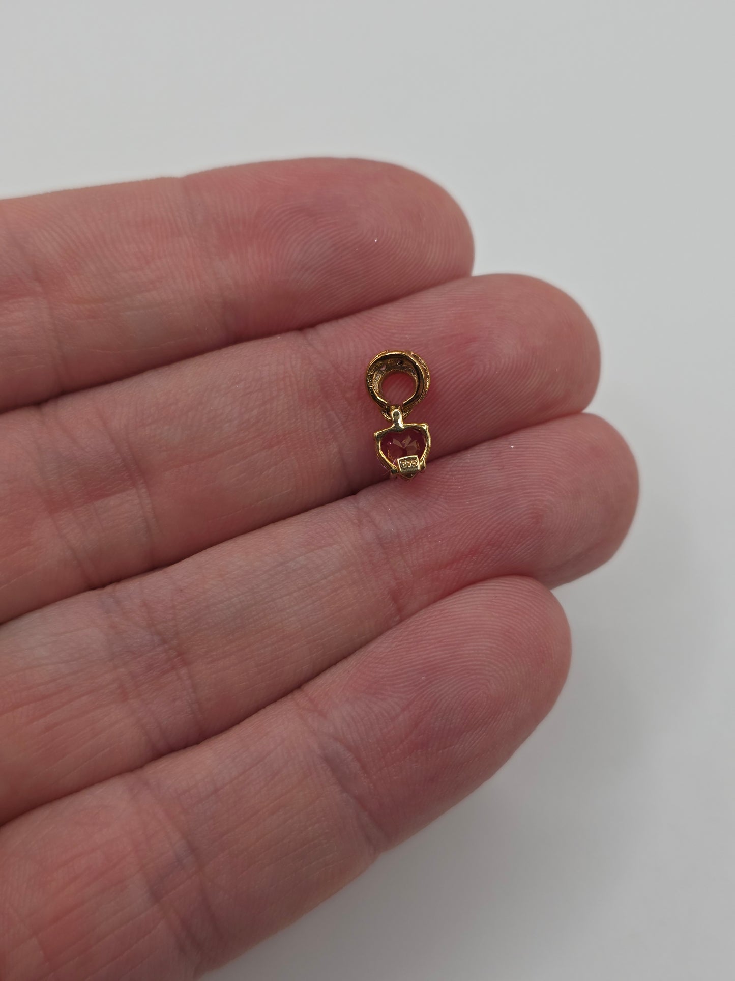 9ct gold pink topaz and diamond pendant