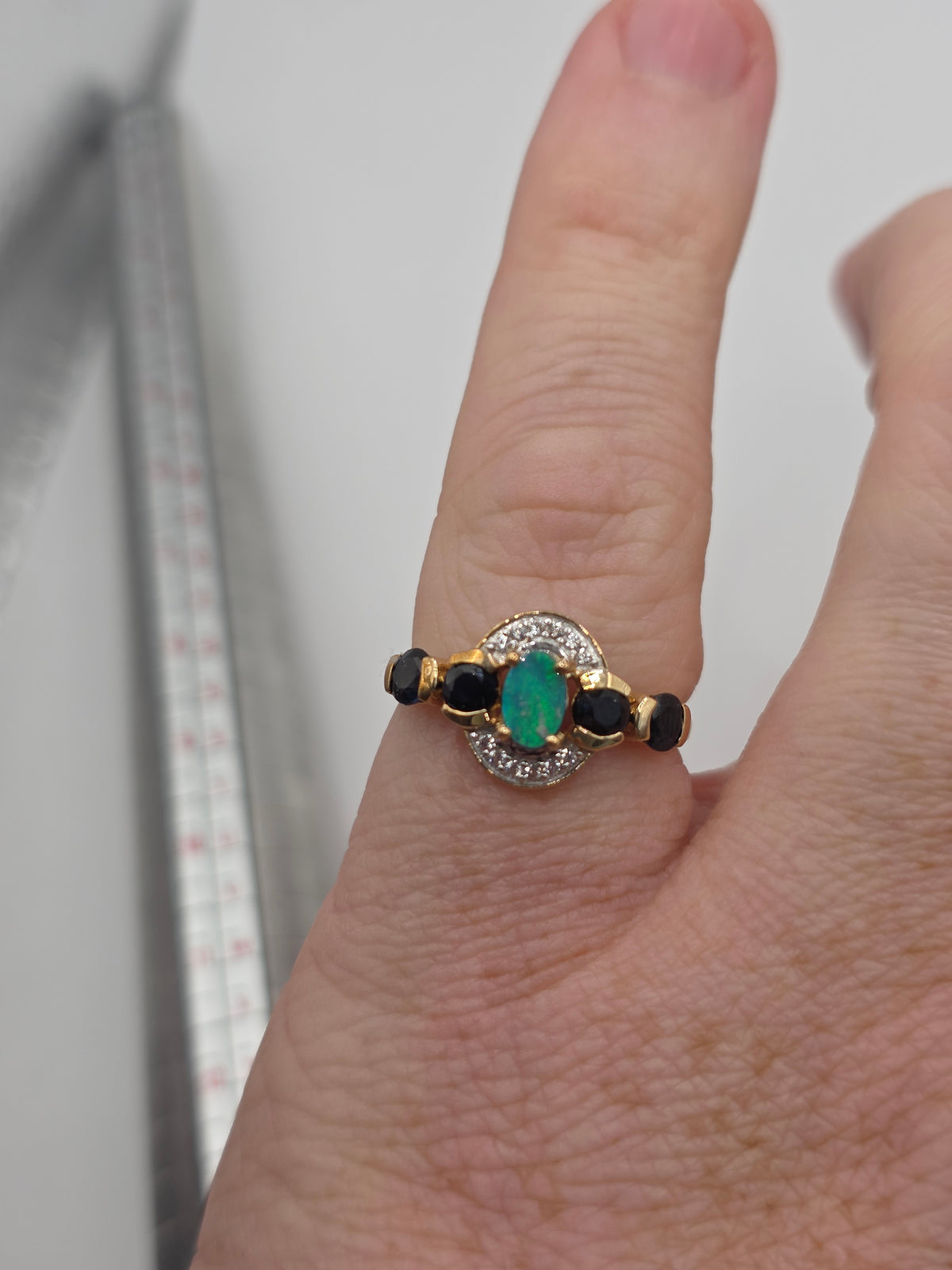 9ct gold opal doublet, sapphire and white zircon ring