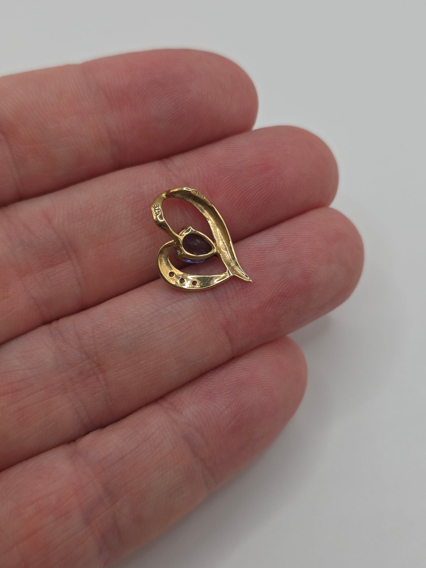 9ct gold tanzanite and diamond pendant